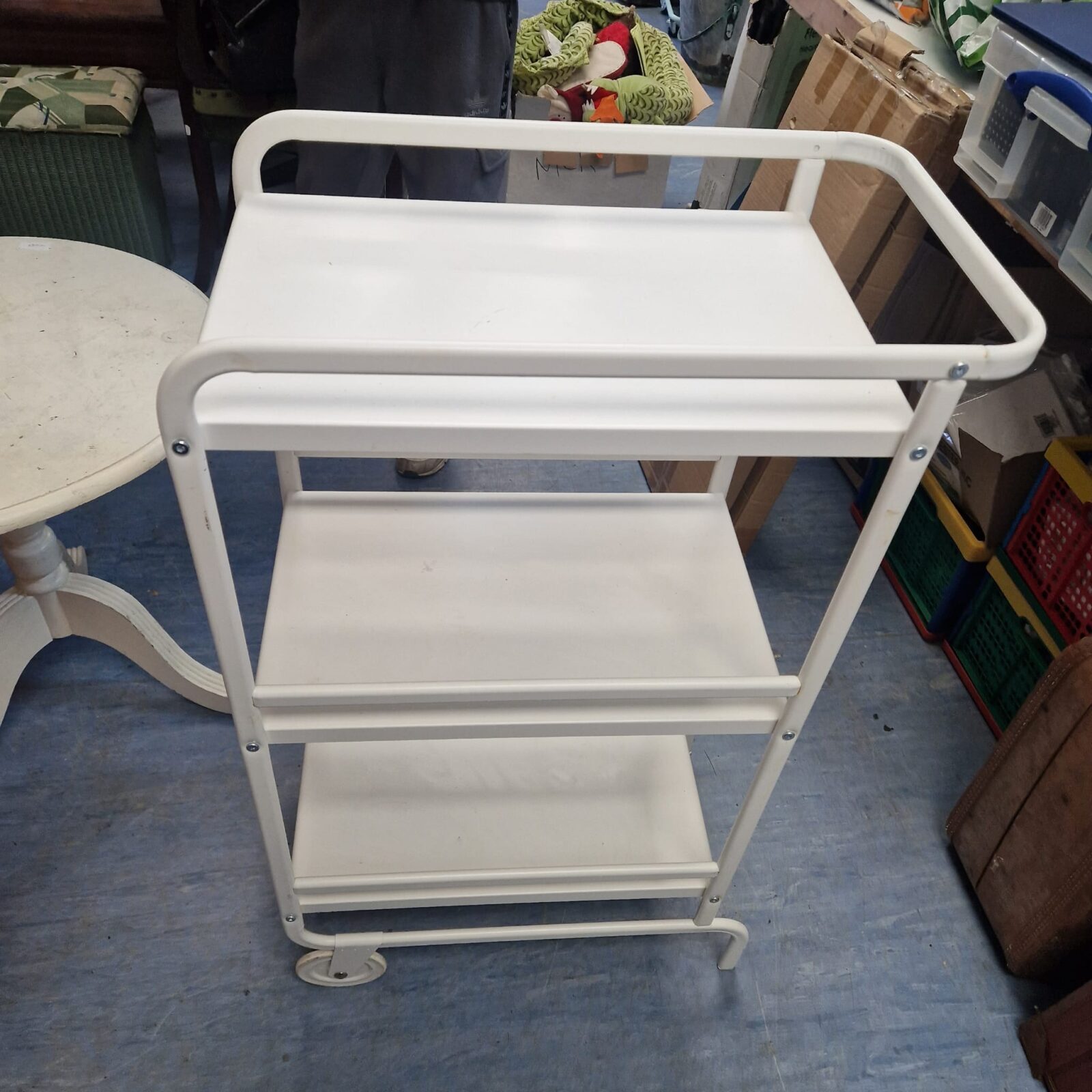White wheeled serving trolley