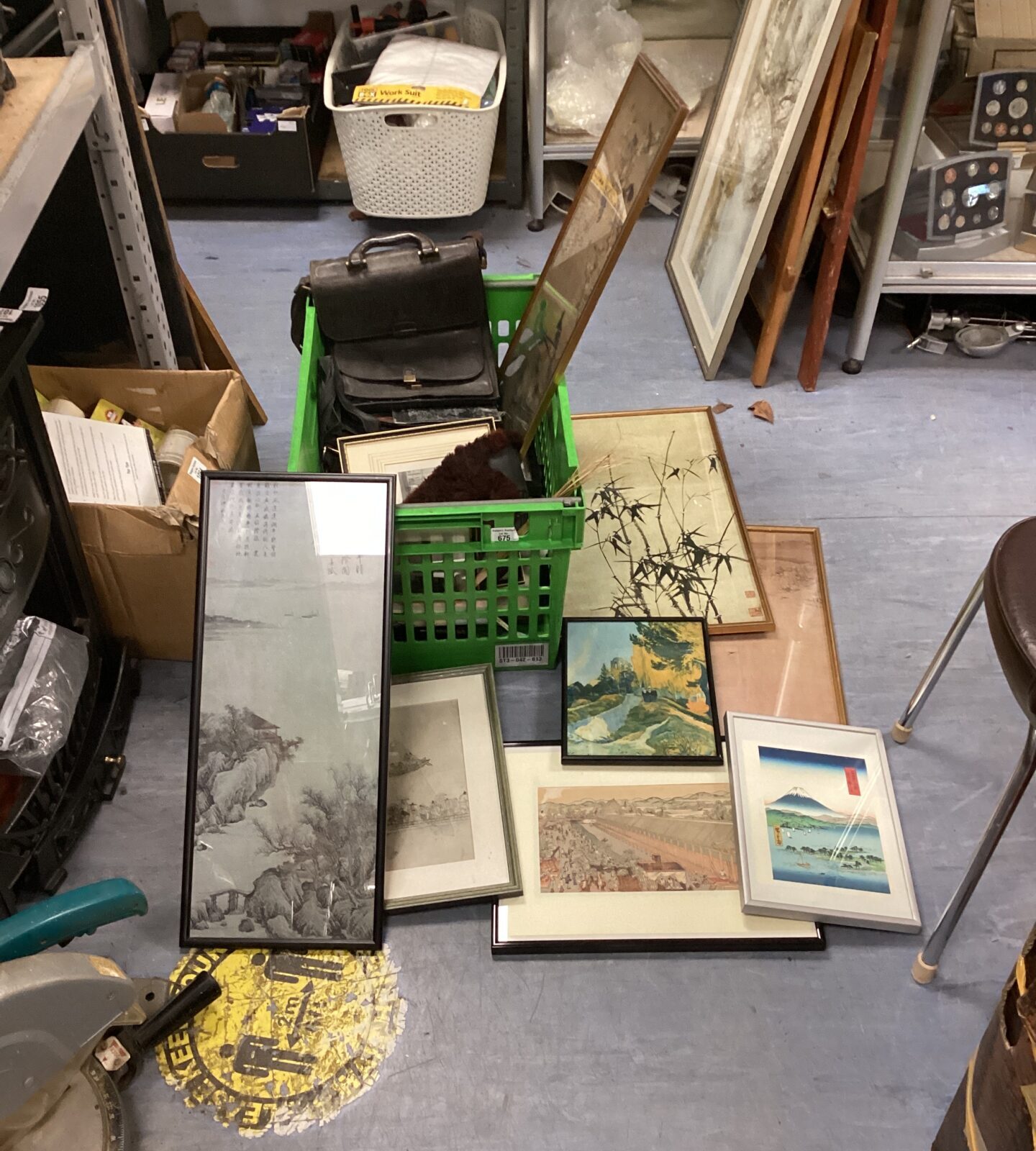 Crate of mixed oriental prints & leather bags