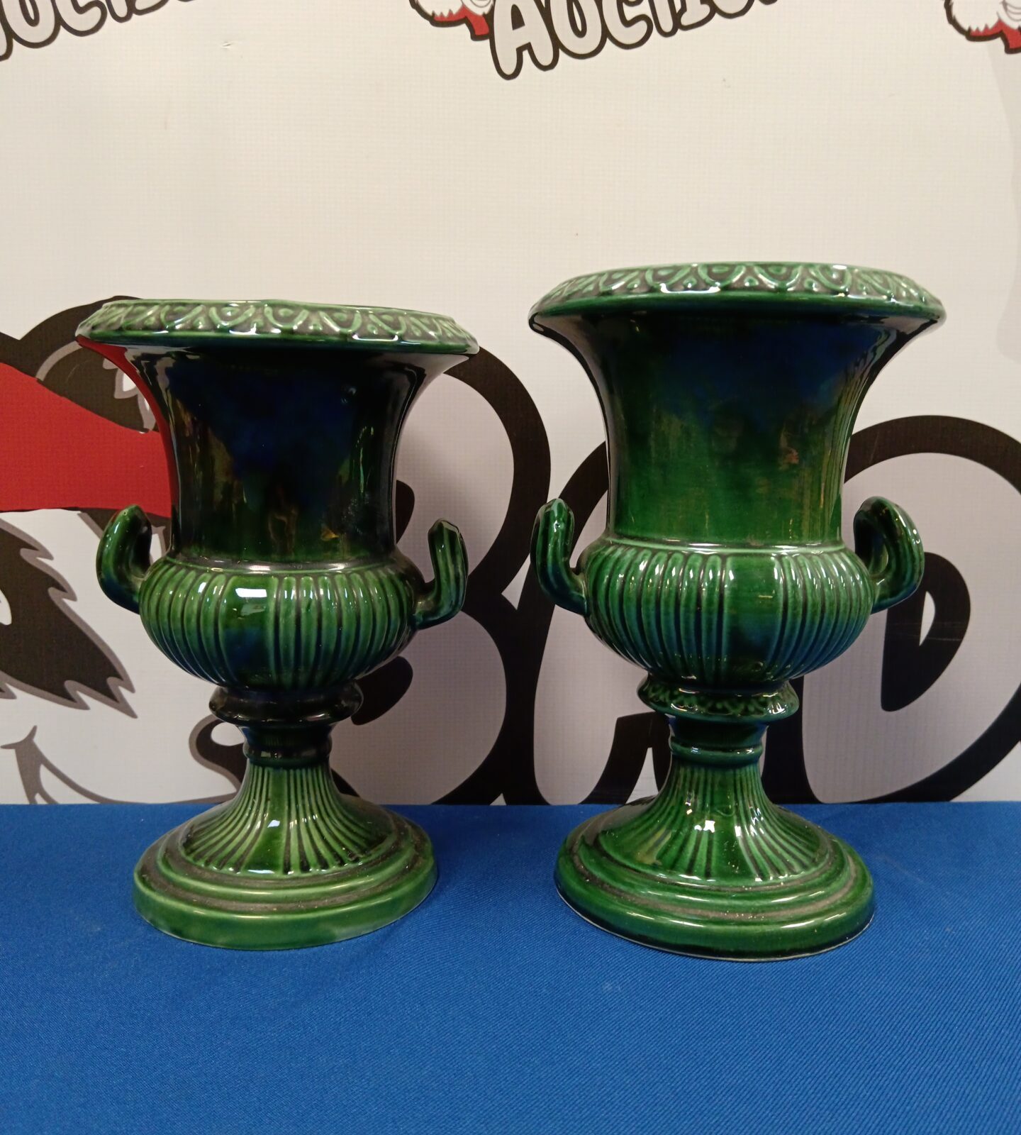 Pair of Dartmouth pottery 8.5" urns