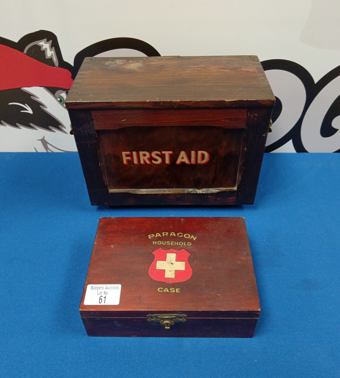 Two vintage wooden first aid boxes with contents