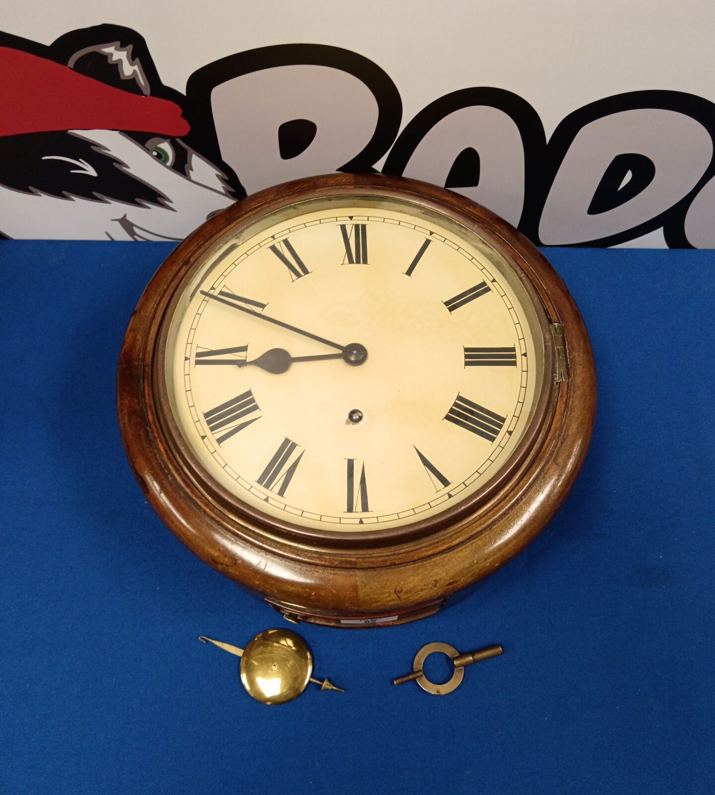 Antique w & h oak cased wall clock with pendulum & key