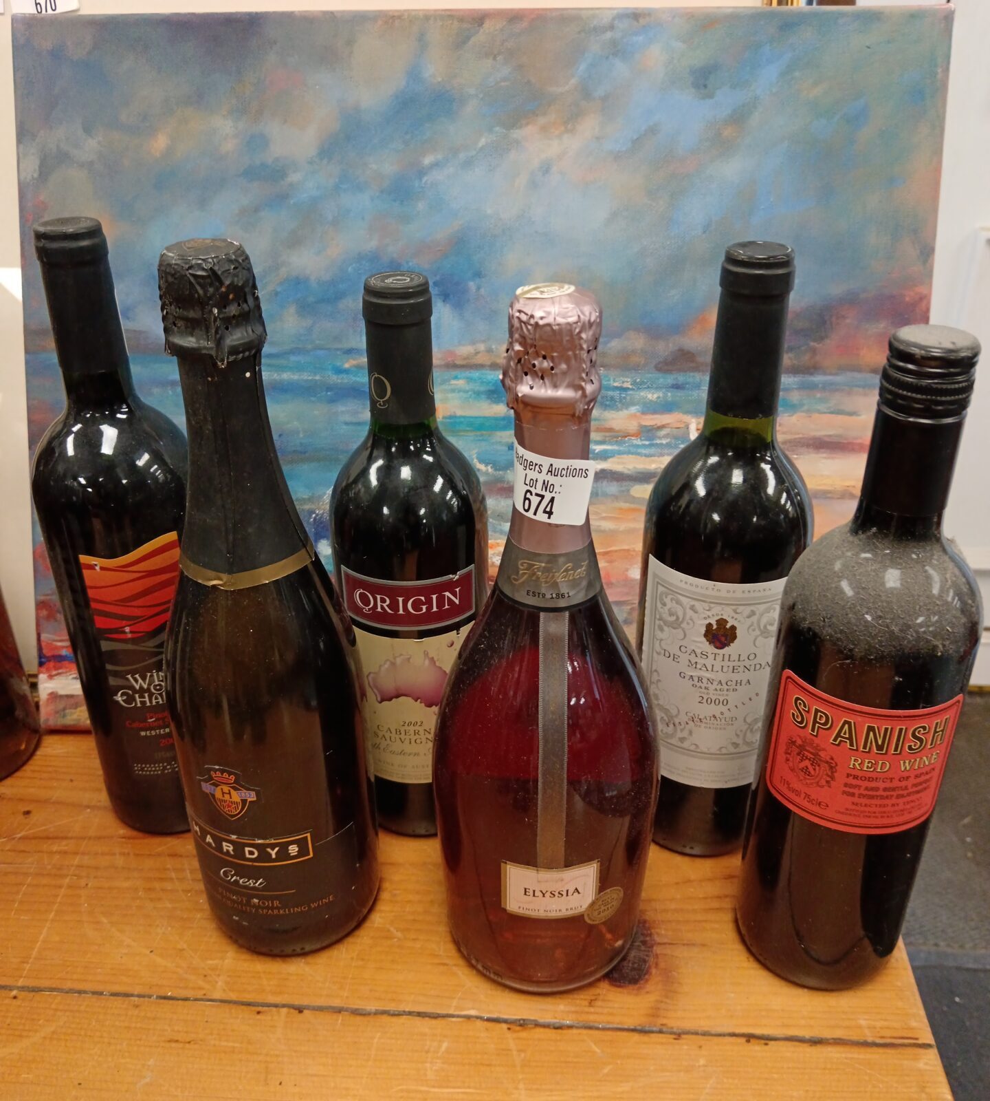 Six bottles of wine including Castillo de maluenda & hardys