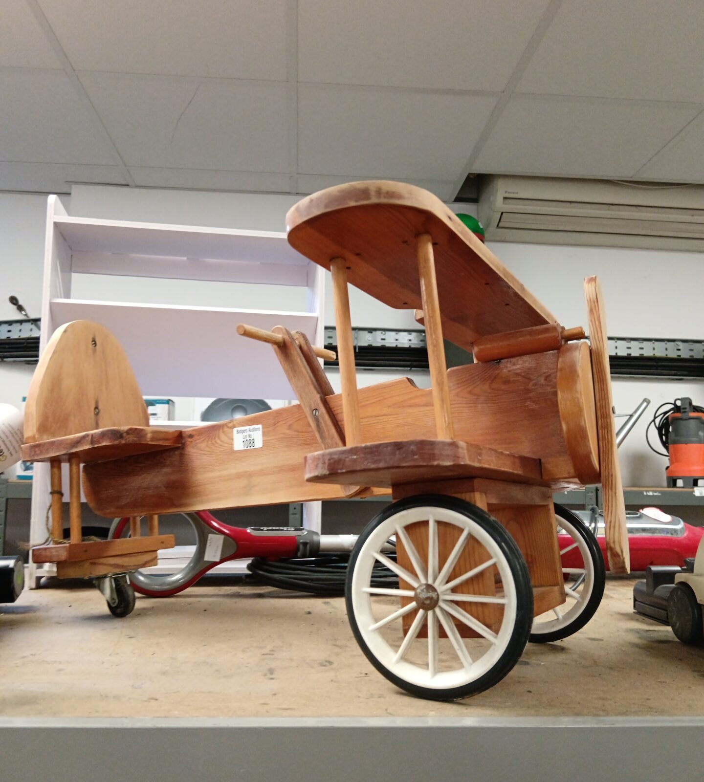 Wooden child's ride on plane