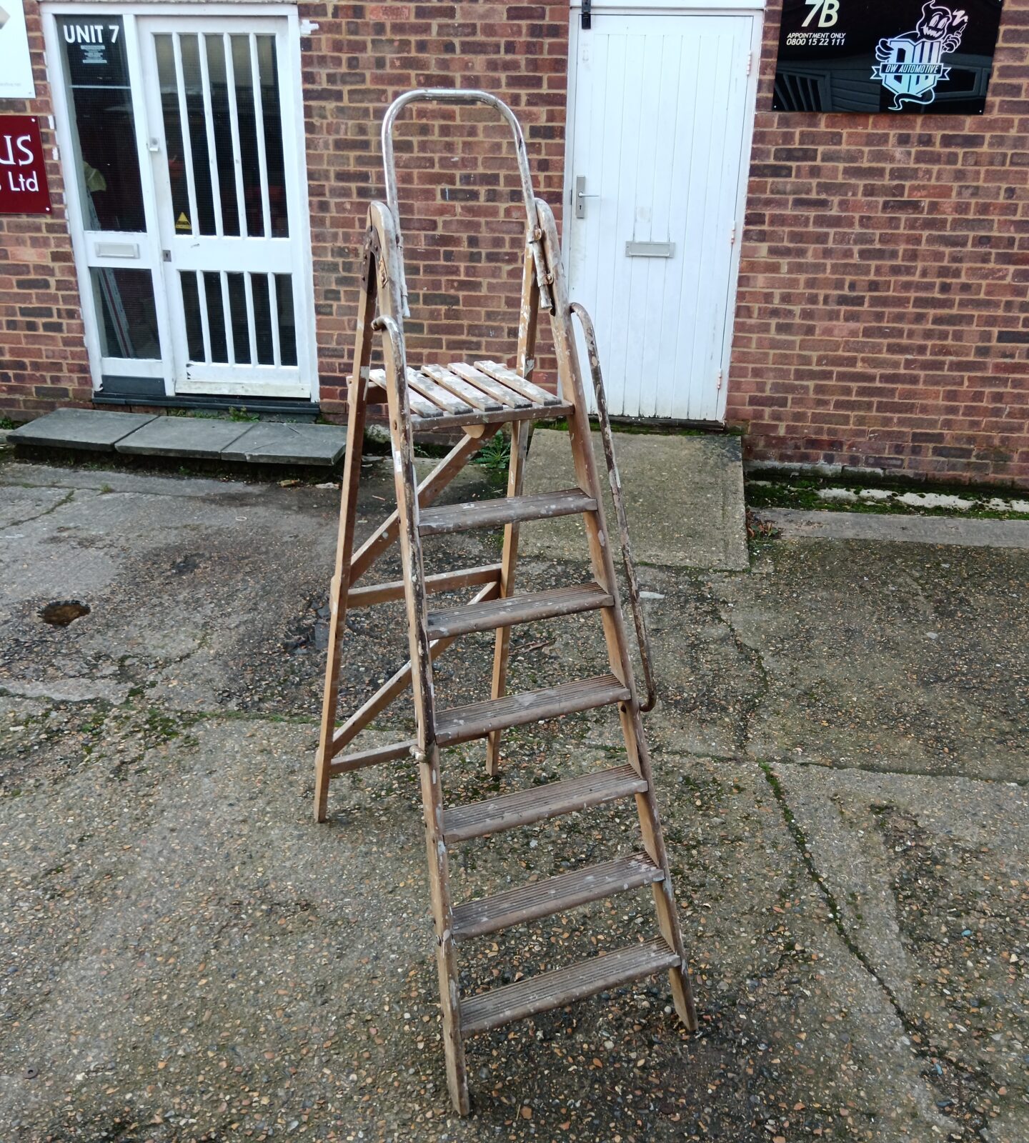 Vintage 7 run wooden step ladder