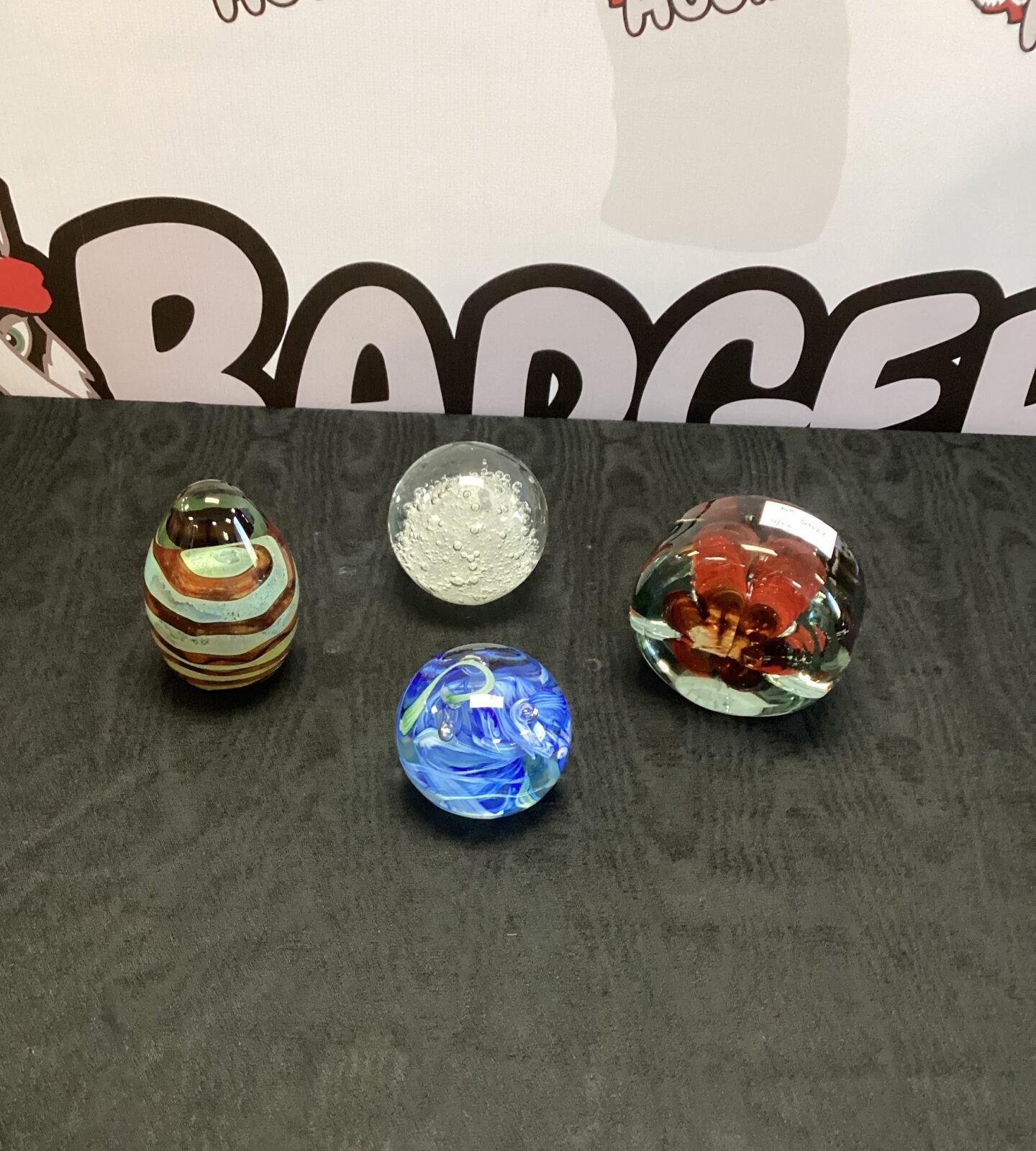 Four Glass Paperweights