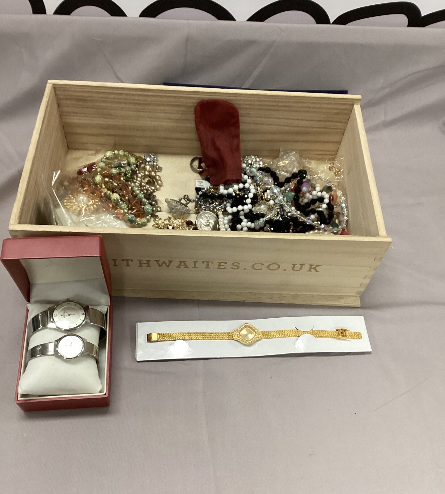 Box of costume jewellery and watches