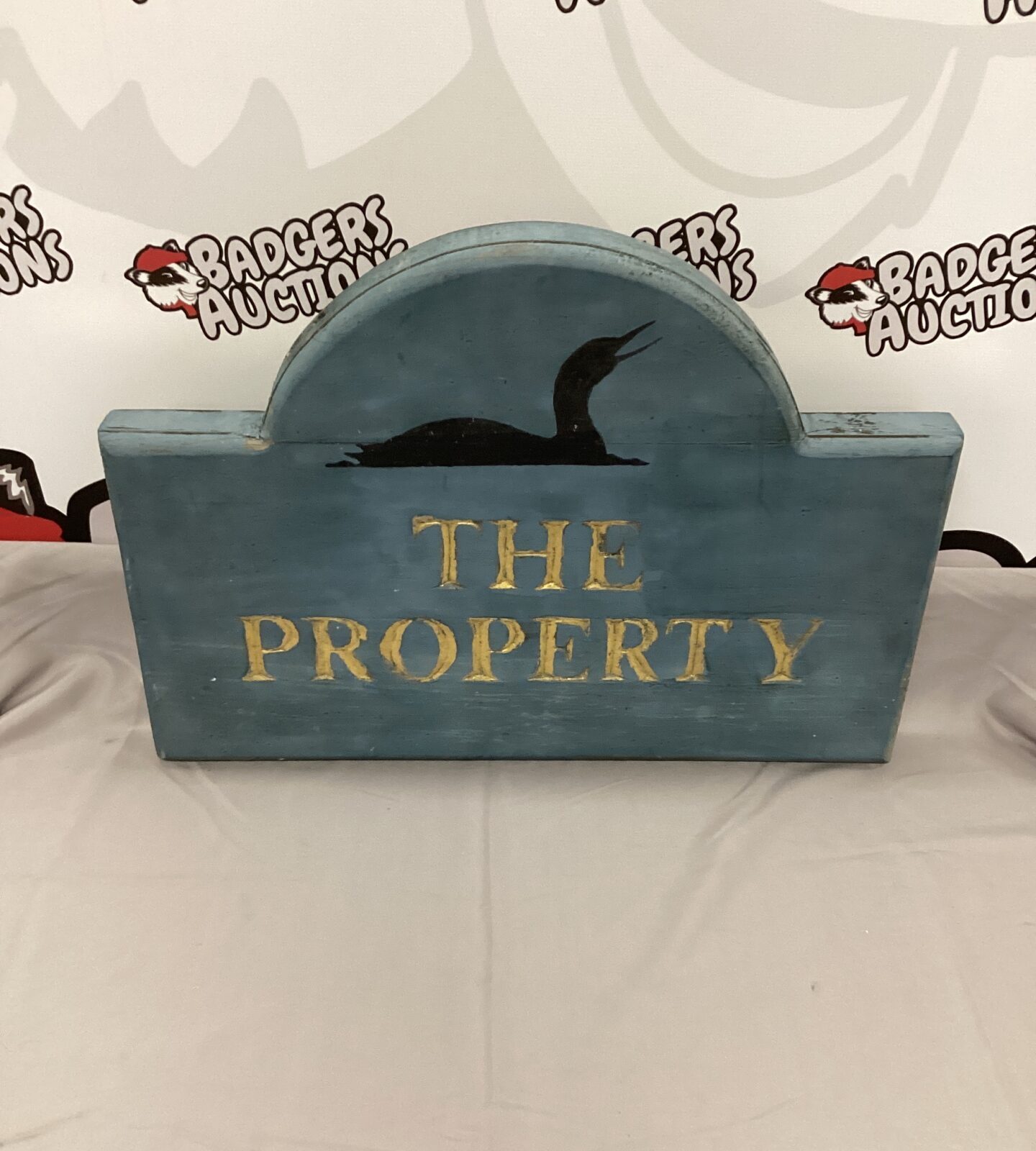 The Property Wooden Sign