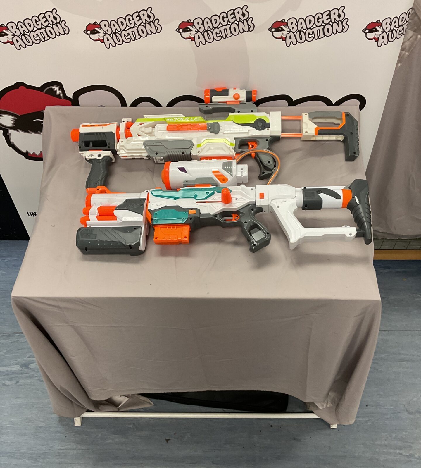 Two nerf guns inc tri-strike and modules editions