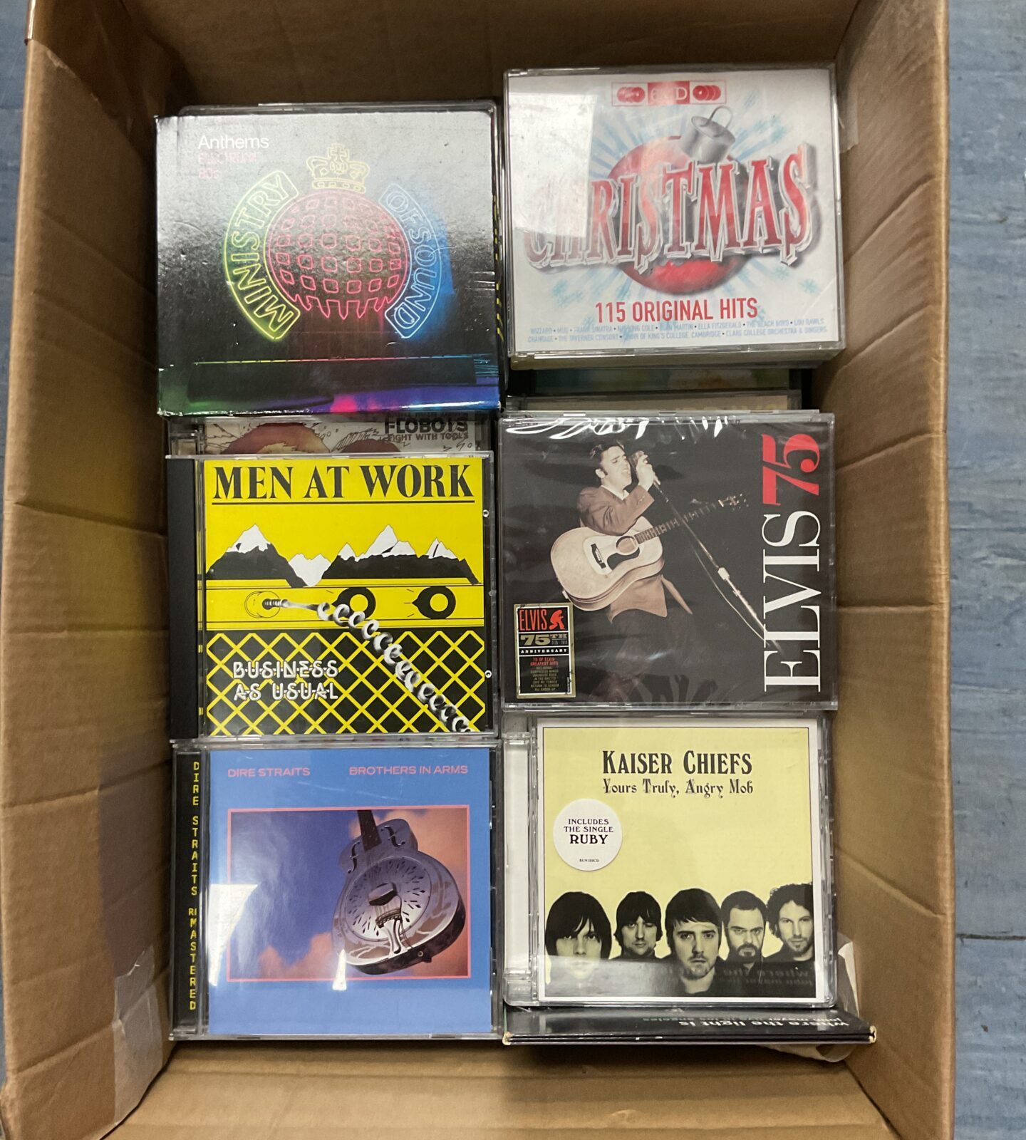 Large collection of CDs including ministry of sound, men at work and dire straits