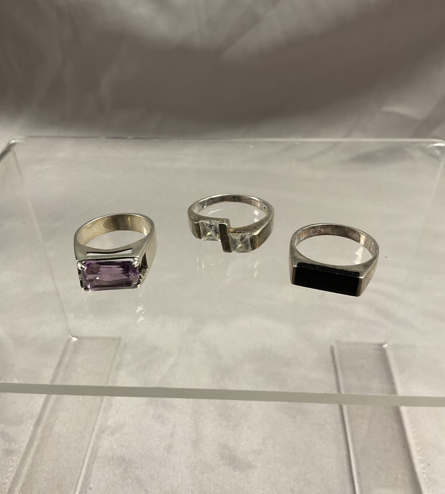 Three 925 Silver stone set rings Sizes L O Q 12.6g gross