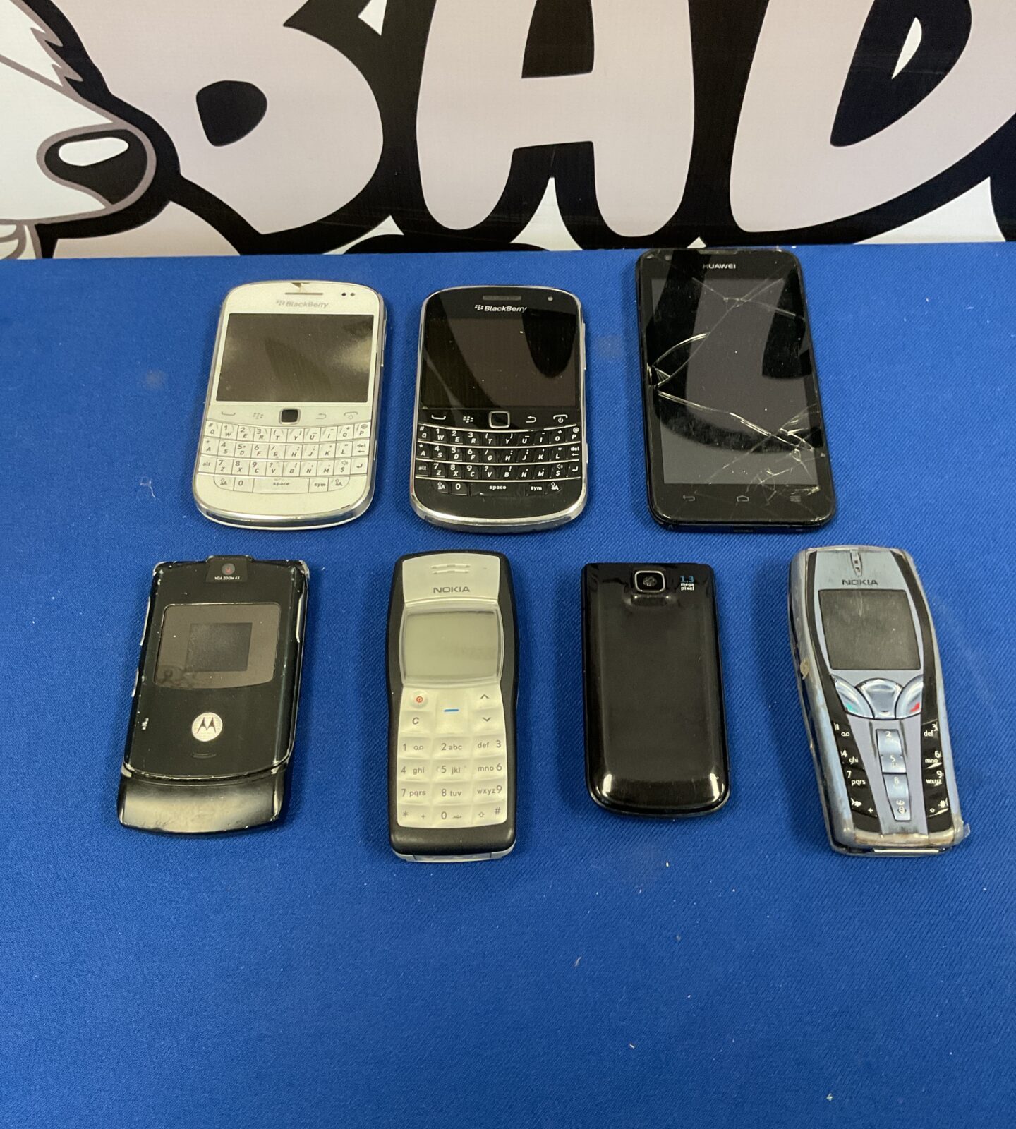 Collection of various phones including blackberry, Nokia, huawei and Motorola