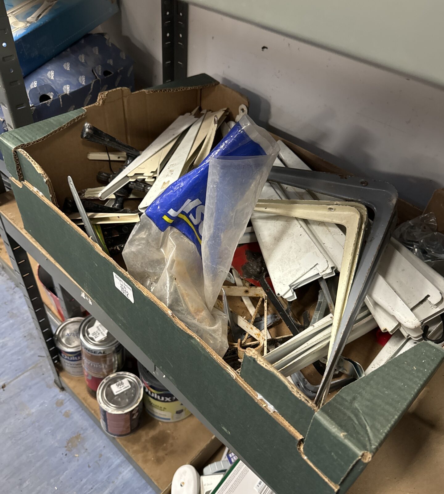 Tray of assorted hanging brackets