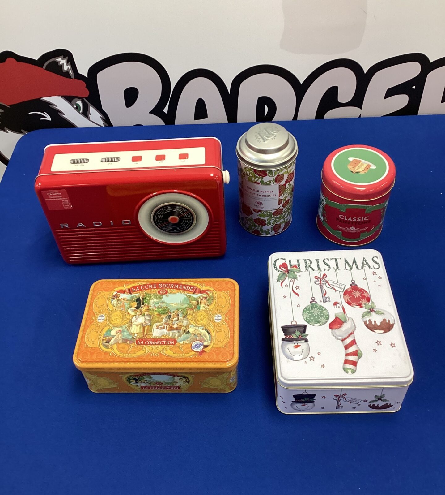 Five Christmas biscuit tins