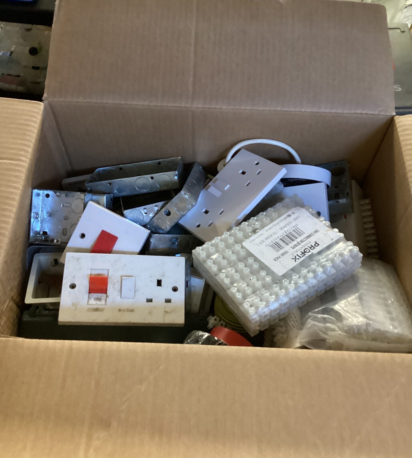 Large box of mixed electrical fittings and sockets