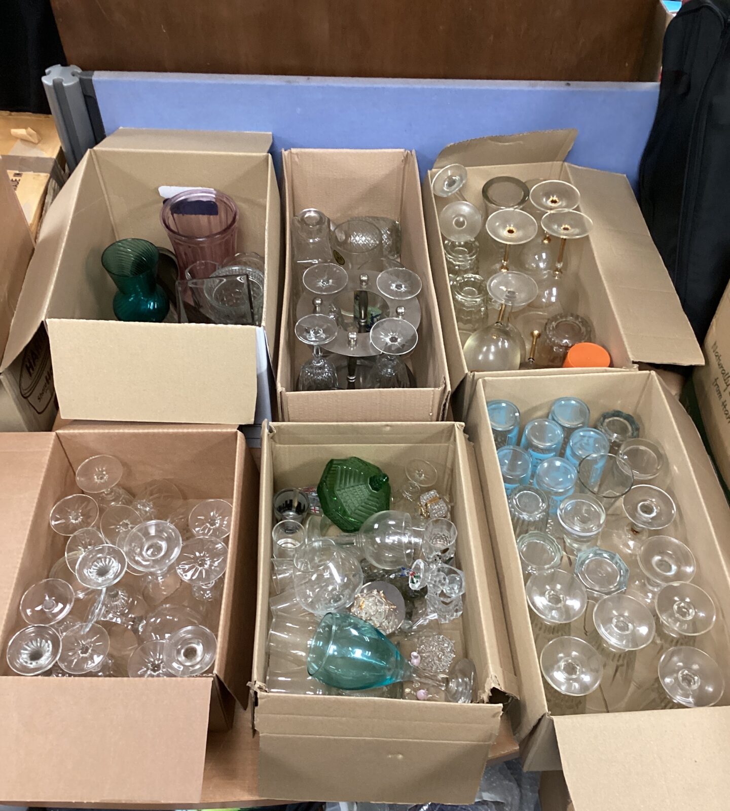 Six boxes of mixed glassware