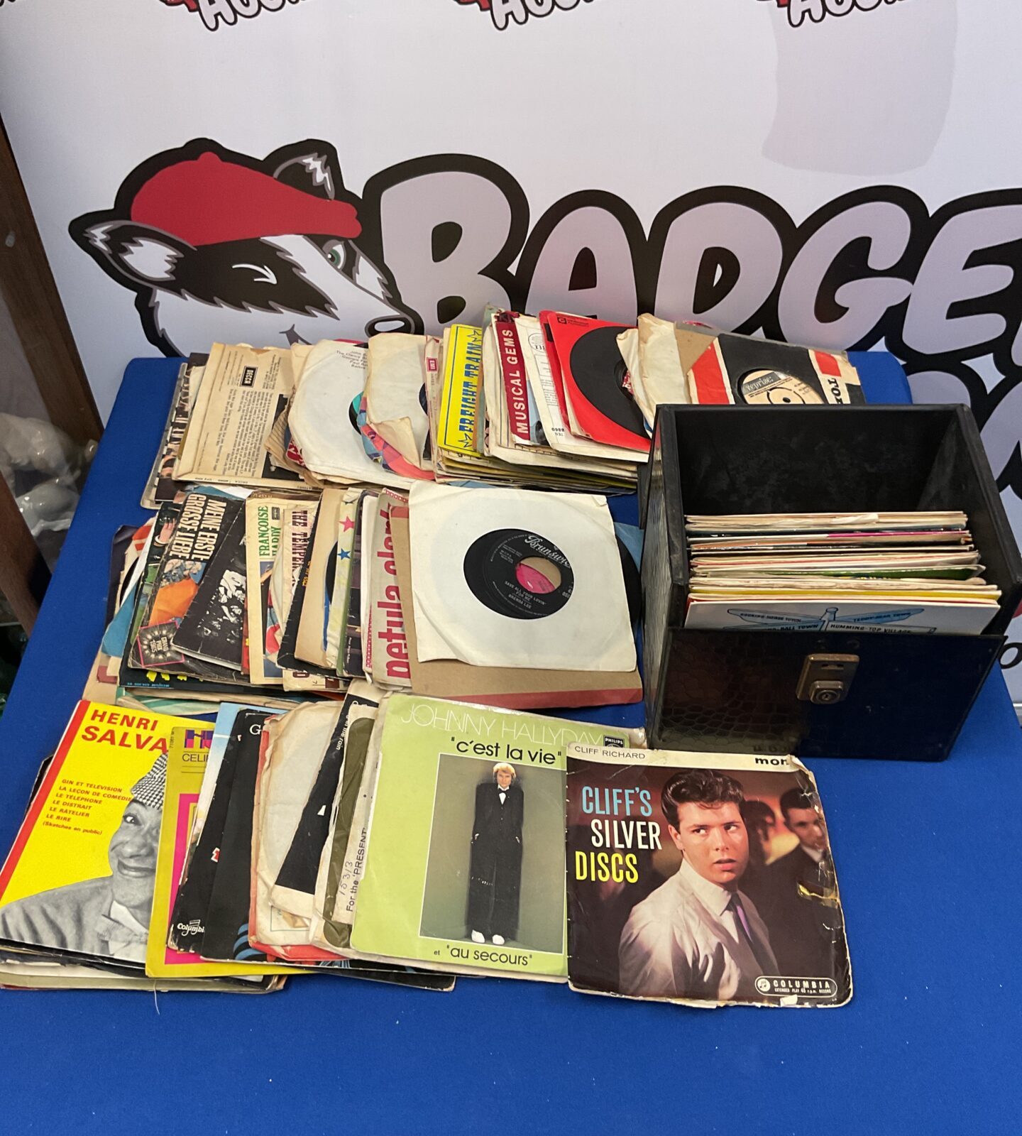 7” vinyl records including Cliff Richard’s and Johnny Hallyday