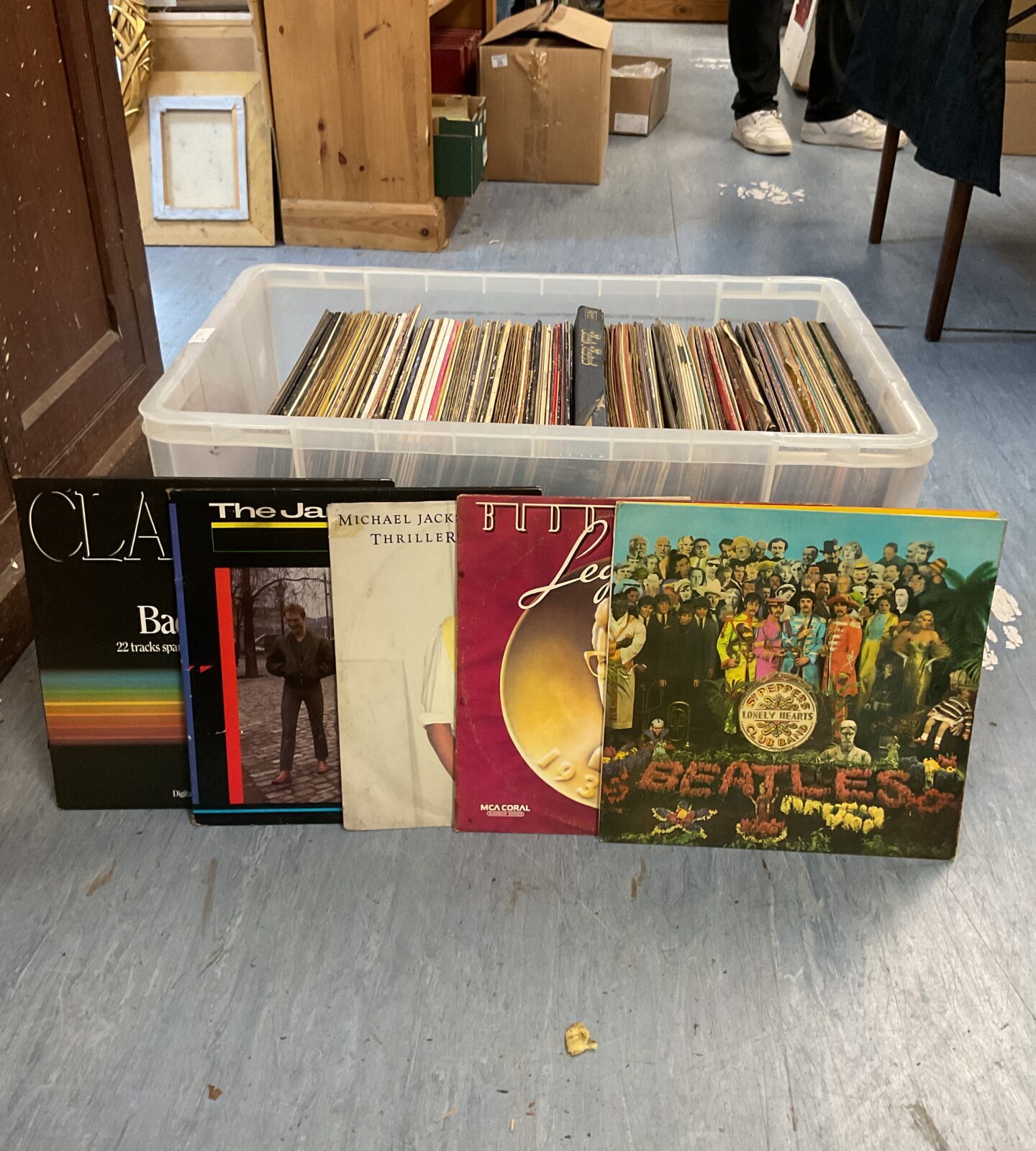 Large collection of classic 12” vinyl records including Eric Clapton, the Jam, Michael Jackson, Buddy Holly and the Beatles