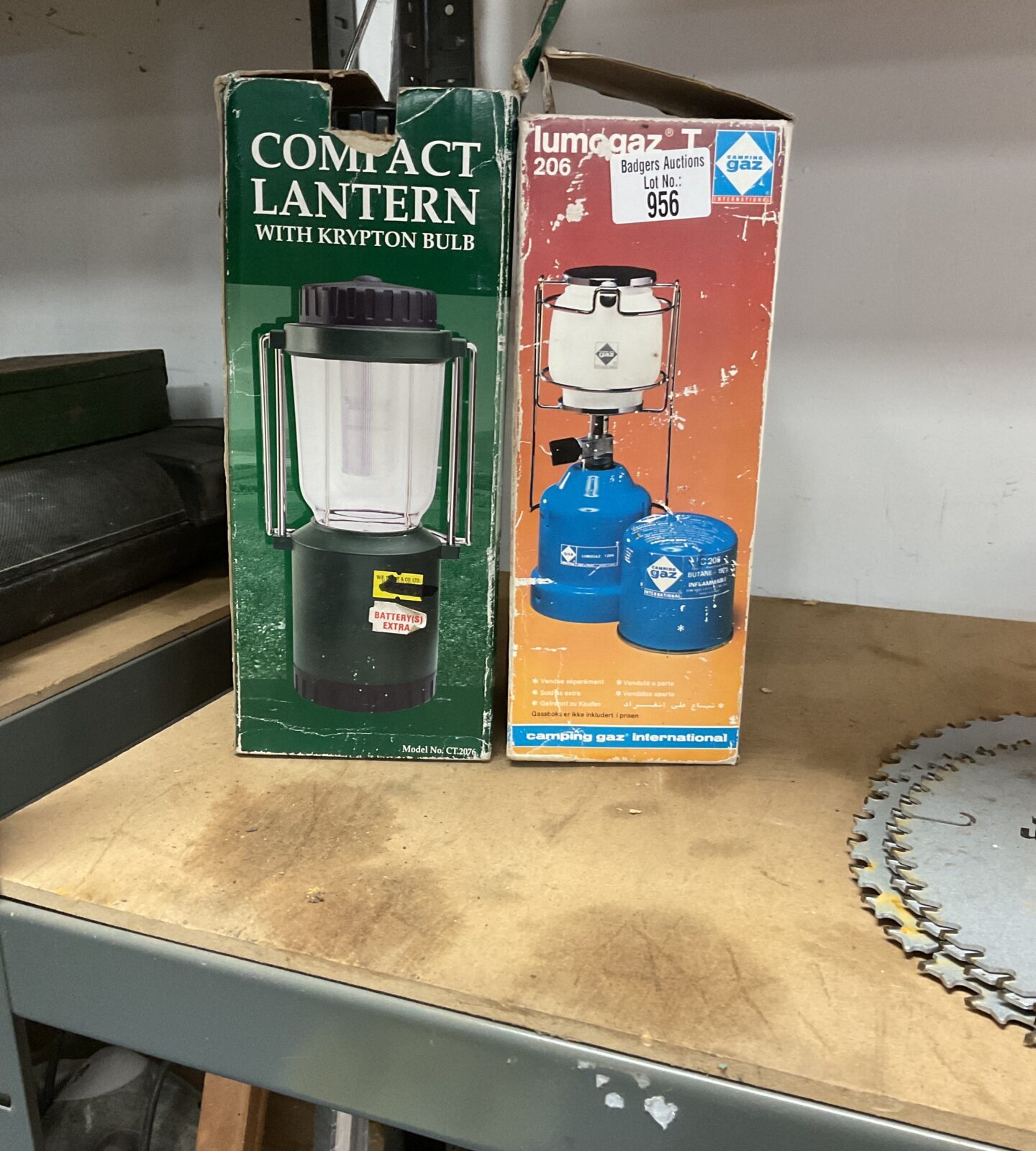 Two compact lanterns inc gas and battery operated