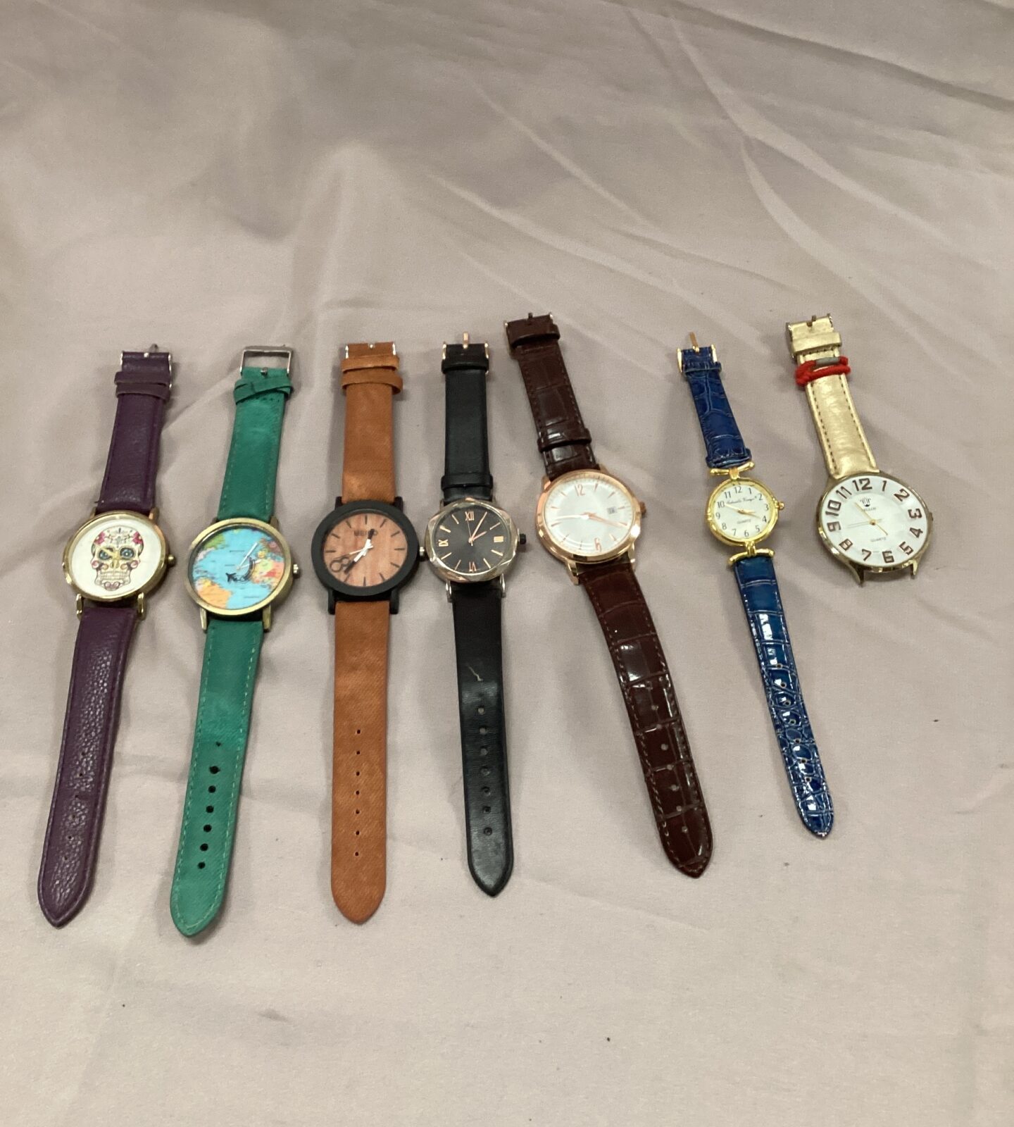 Seven wristwatches inc meibo, day of the dead festival & bellos