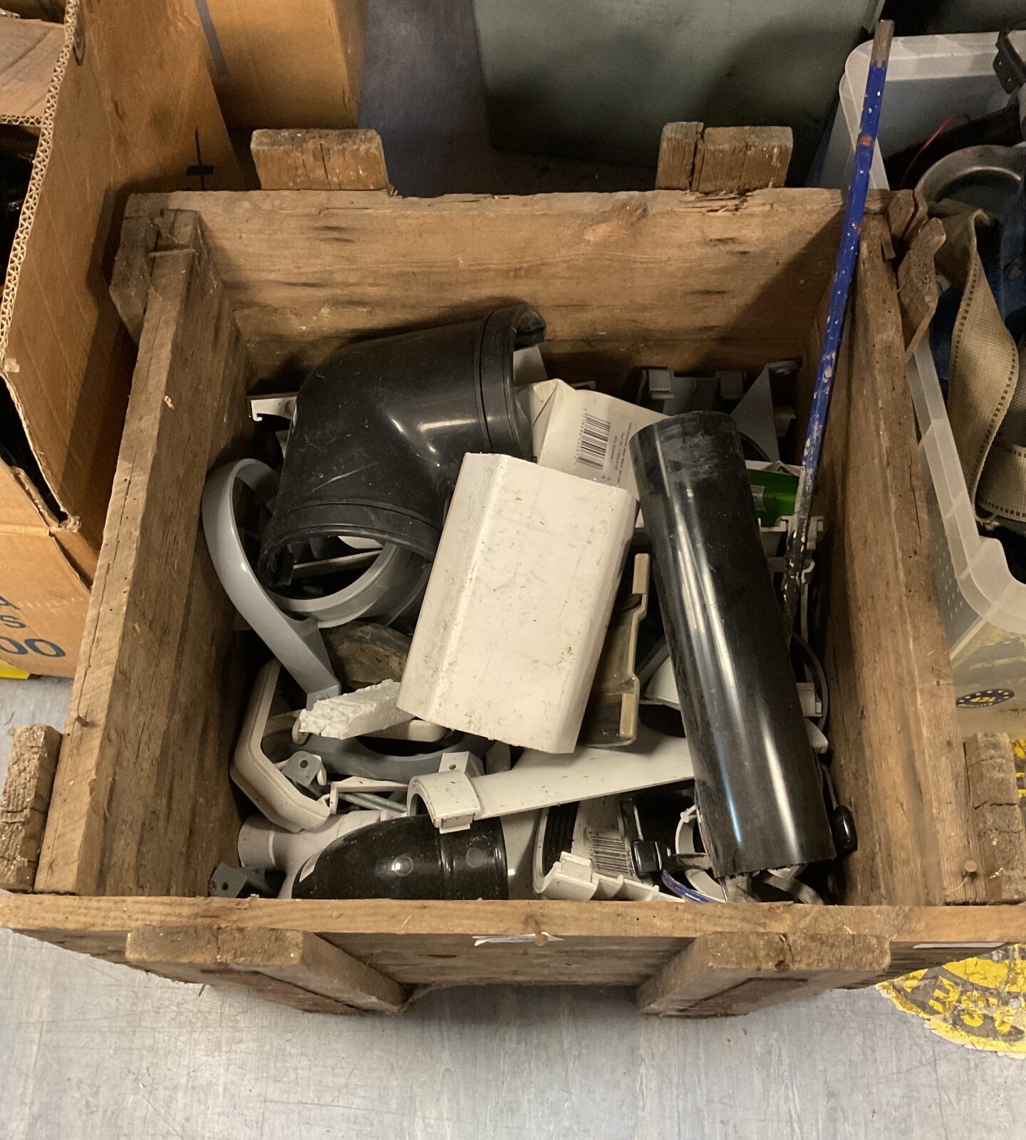 Wooden crate of plumbing fittings