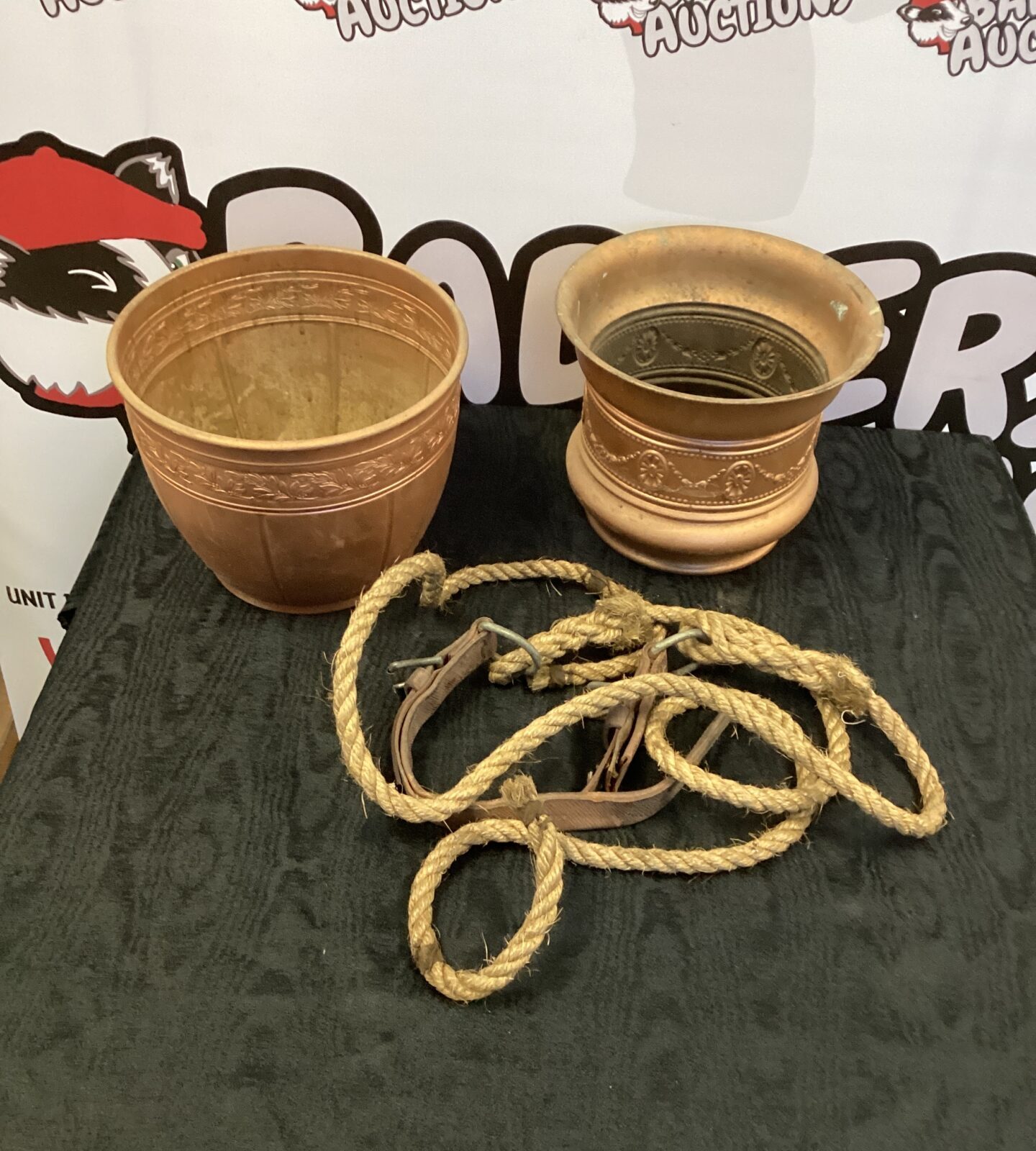 Two cooper plant pots and a horse halter