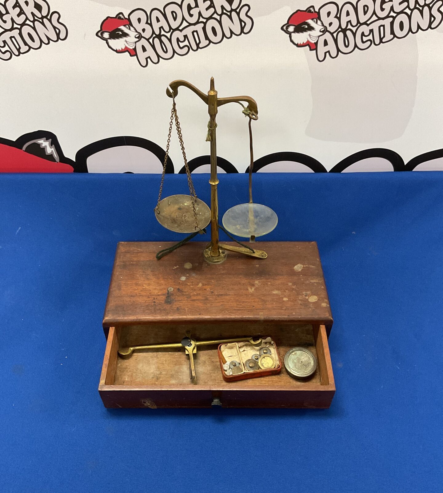 Vintage set of brass balance scales with weights