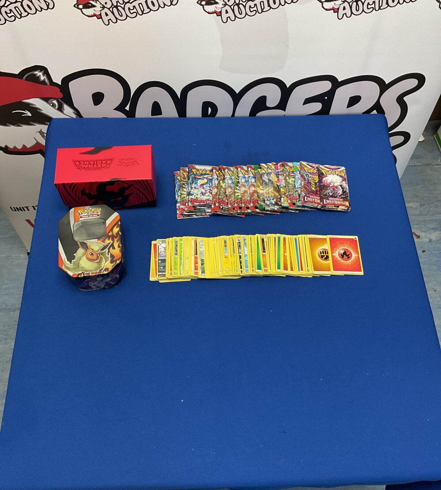 Collection of Pokemons inc selection of cards and opened booster packs, a tin and box