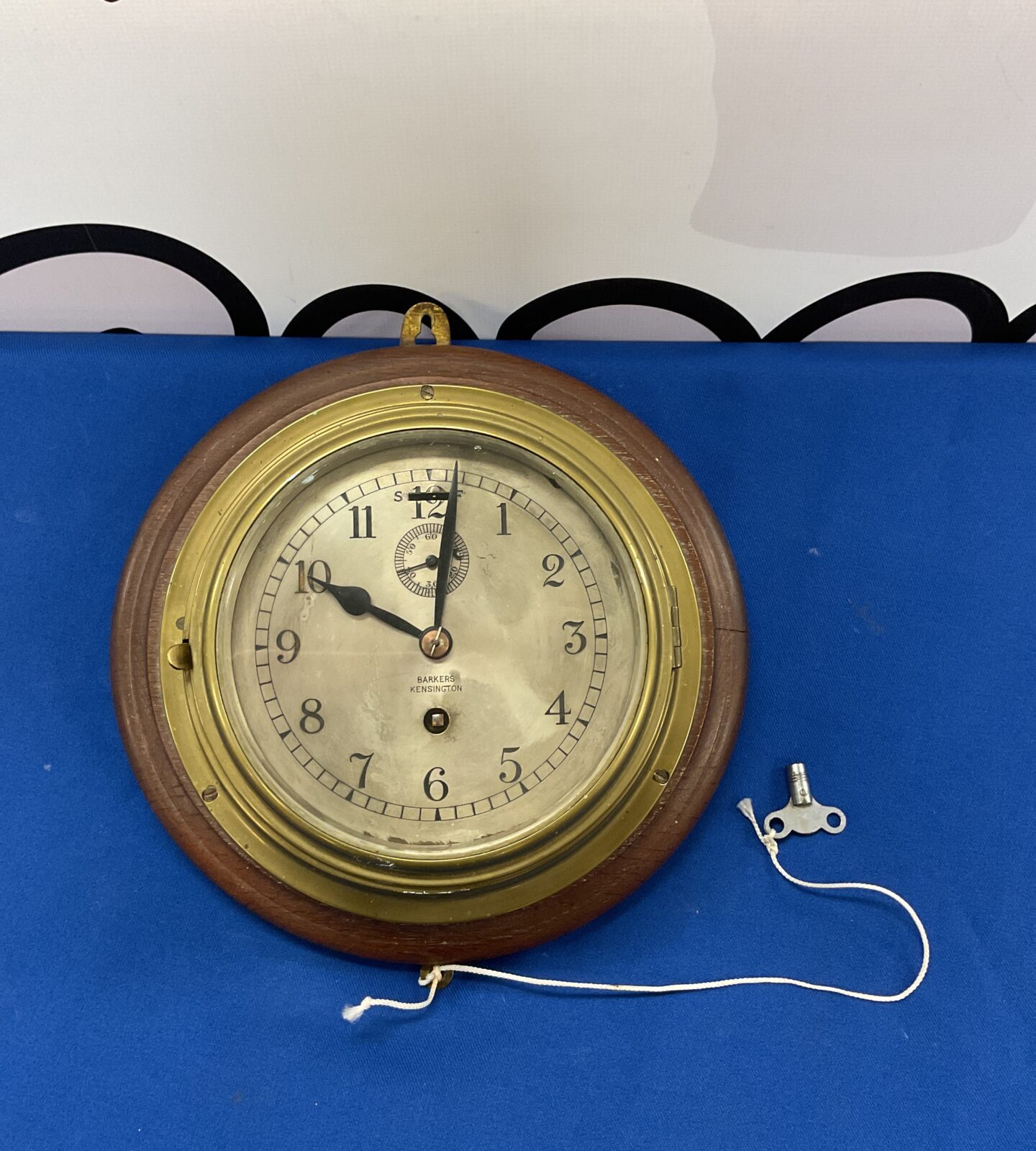 Antique barkers Kensington brass ships clock with key