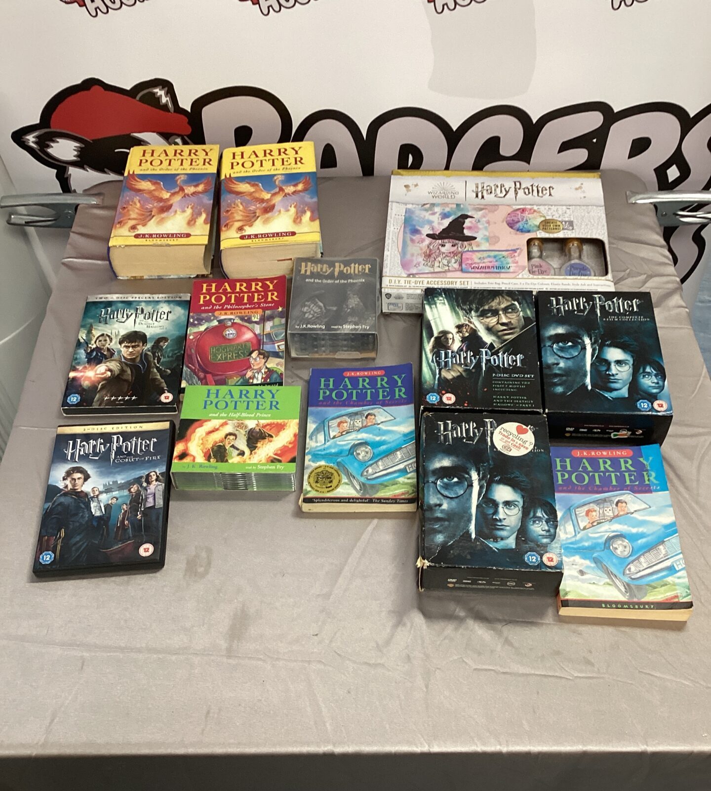 Box of harry potter books, dvds, audio books f tie-dye set