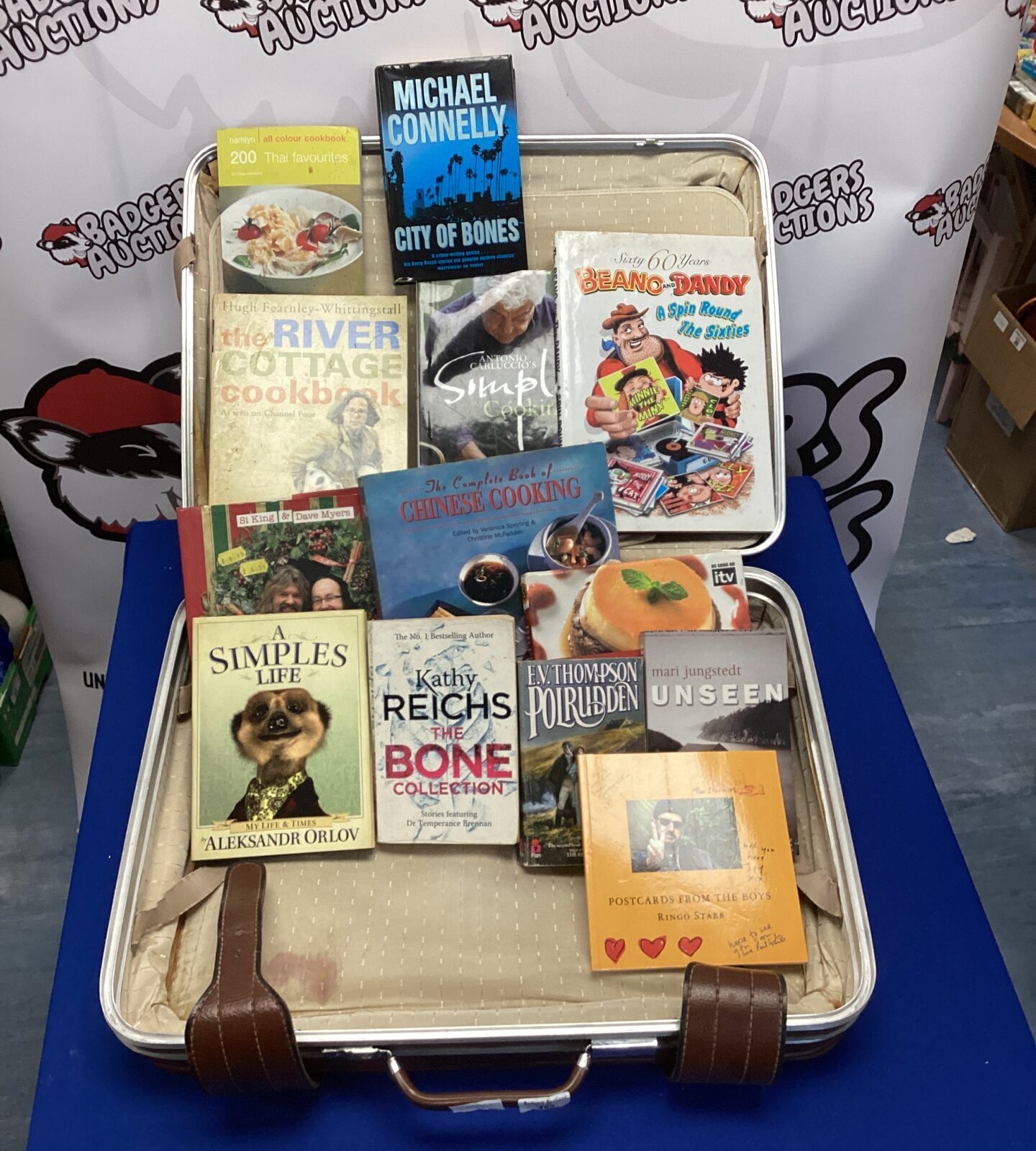 Suitcase of mixed books inc cookbooks