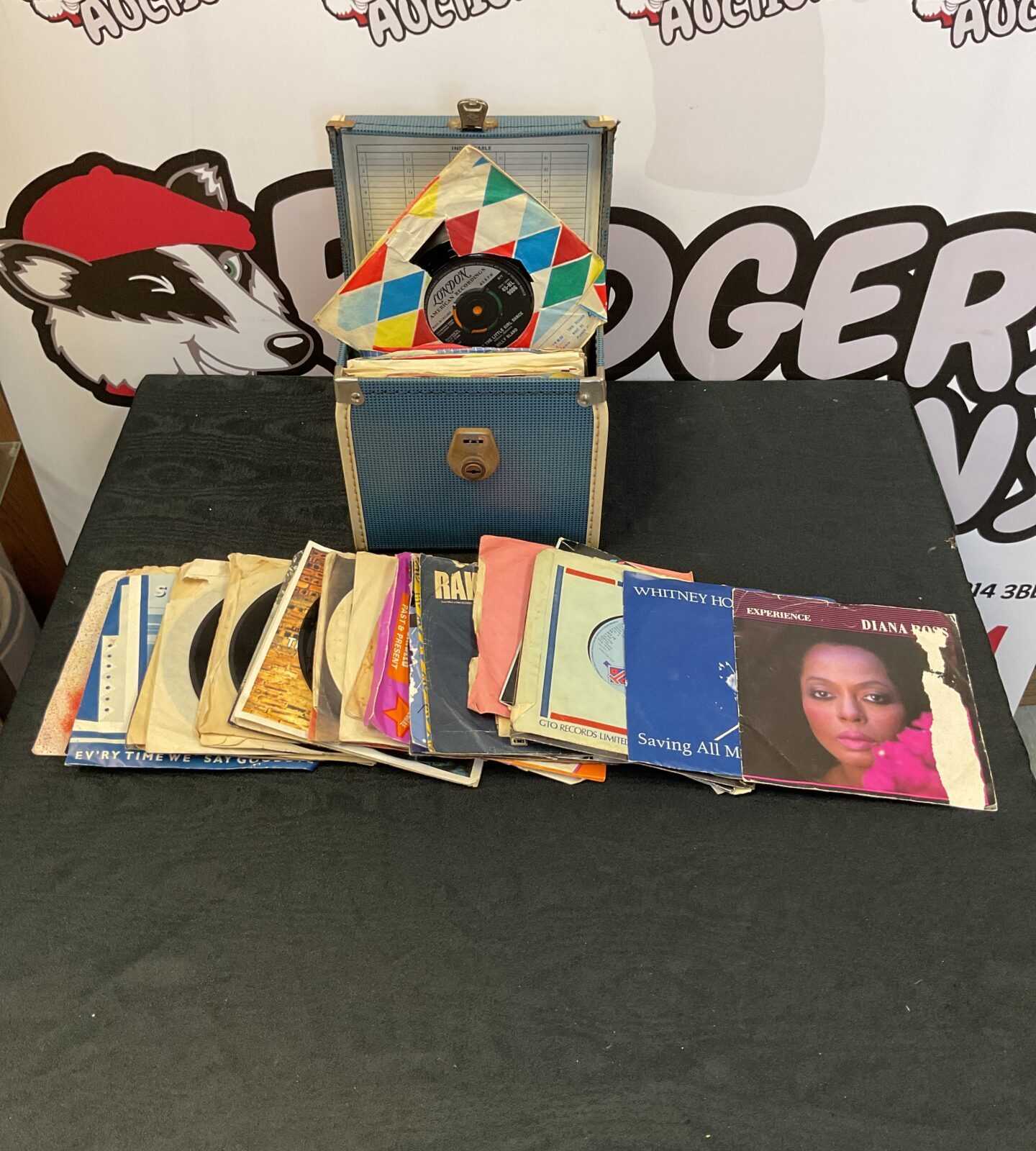 Large collection of 7” vinyl records including Whitney Houston and Diana Ross