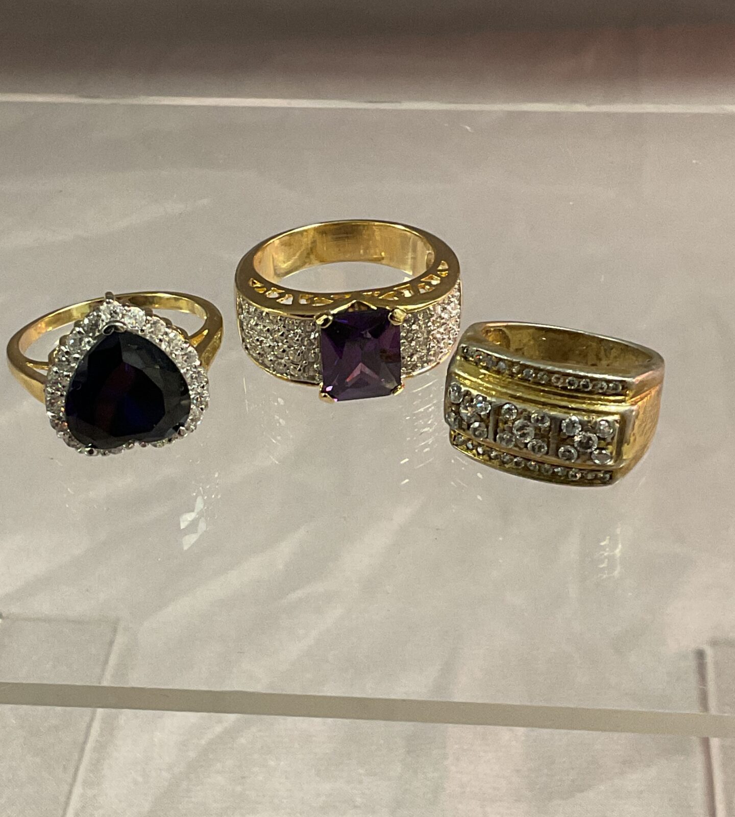 Three 925 Silver Gilt stone set rings sizes K R S