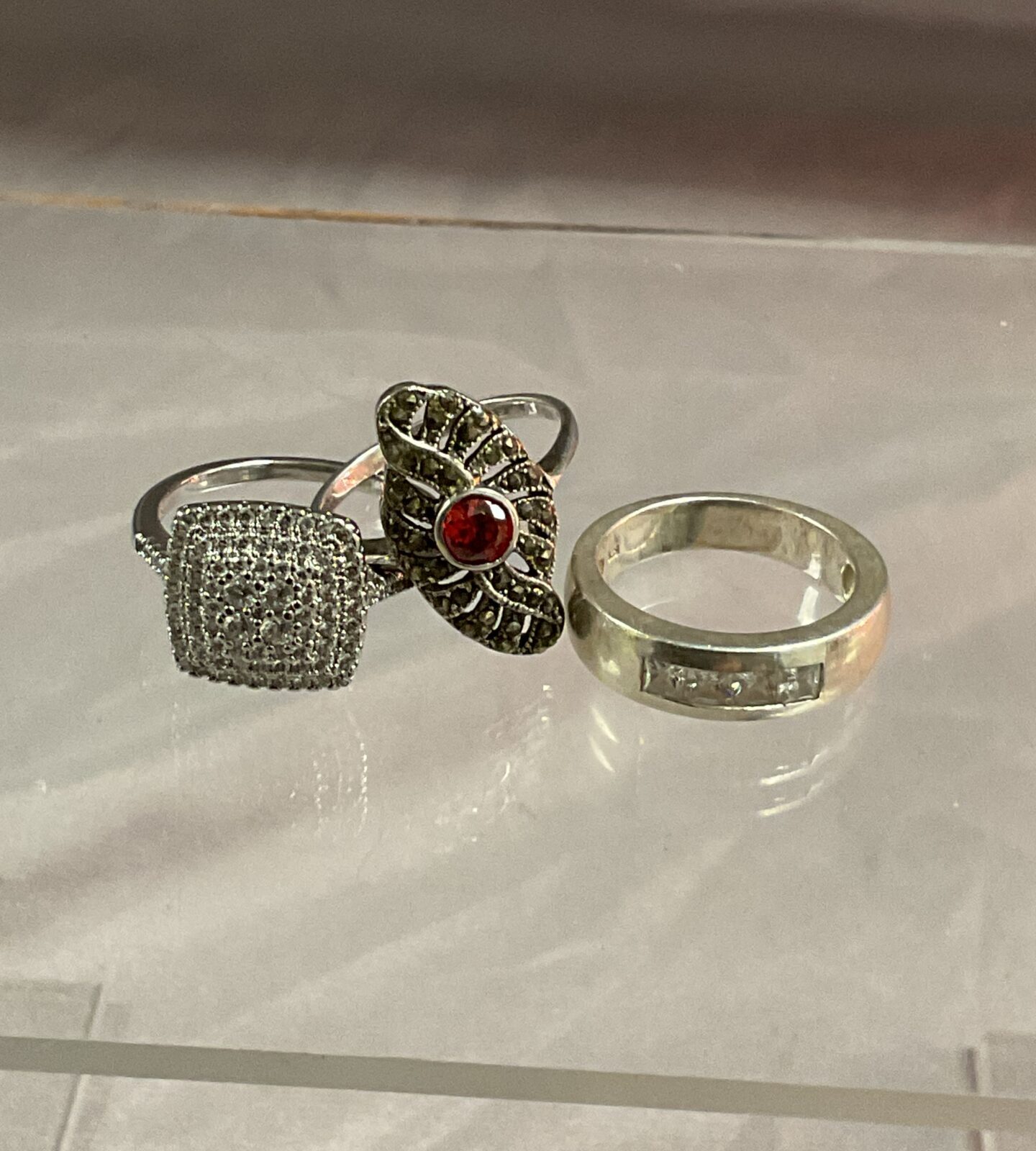 Three 925 silver stone set rings sizes N O T