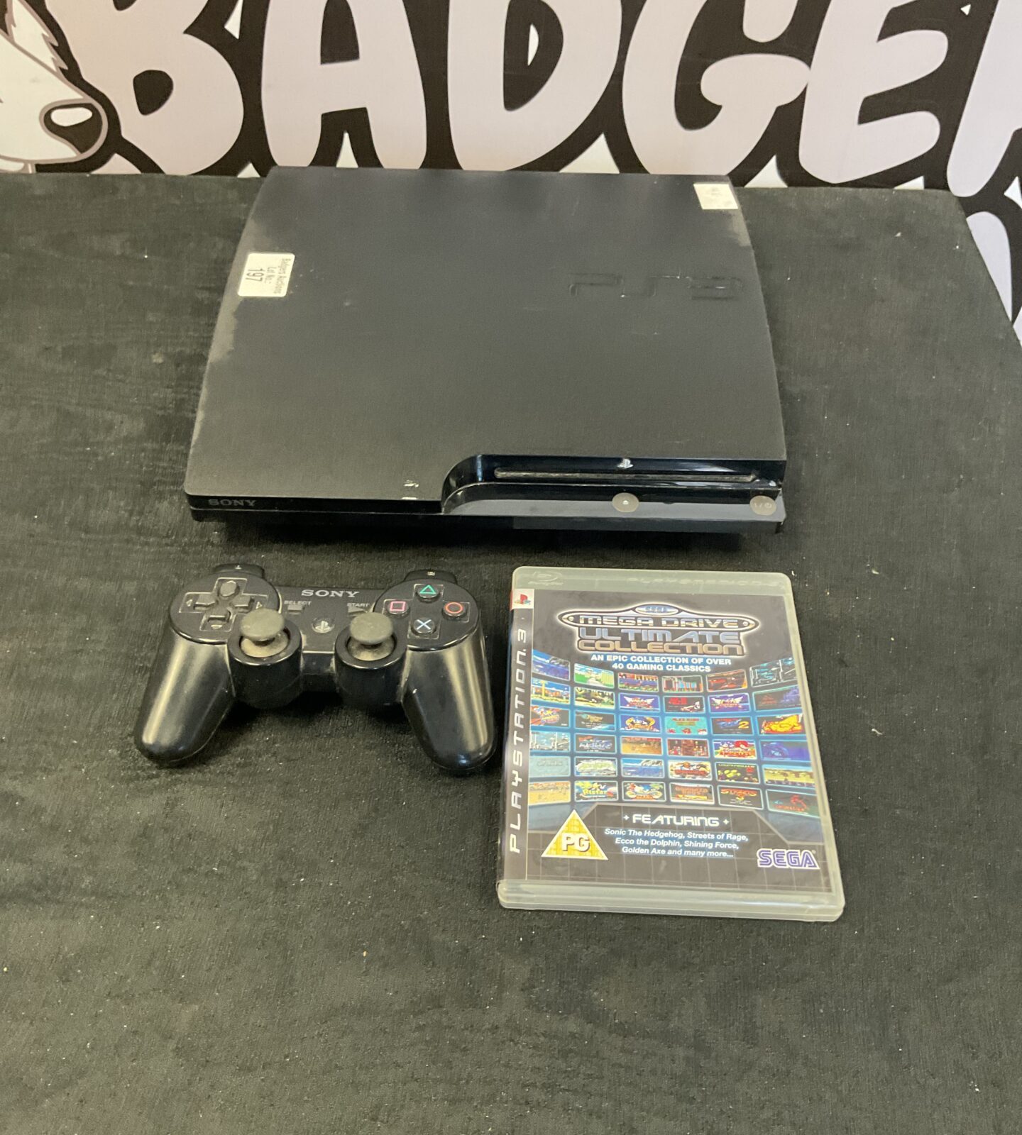 Sony PlayStation 3 console with one controller and Sega megadrive collection game (no canles for console)