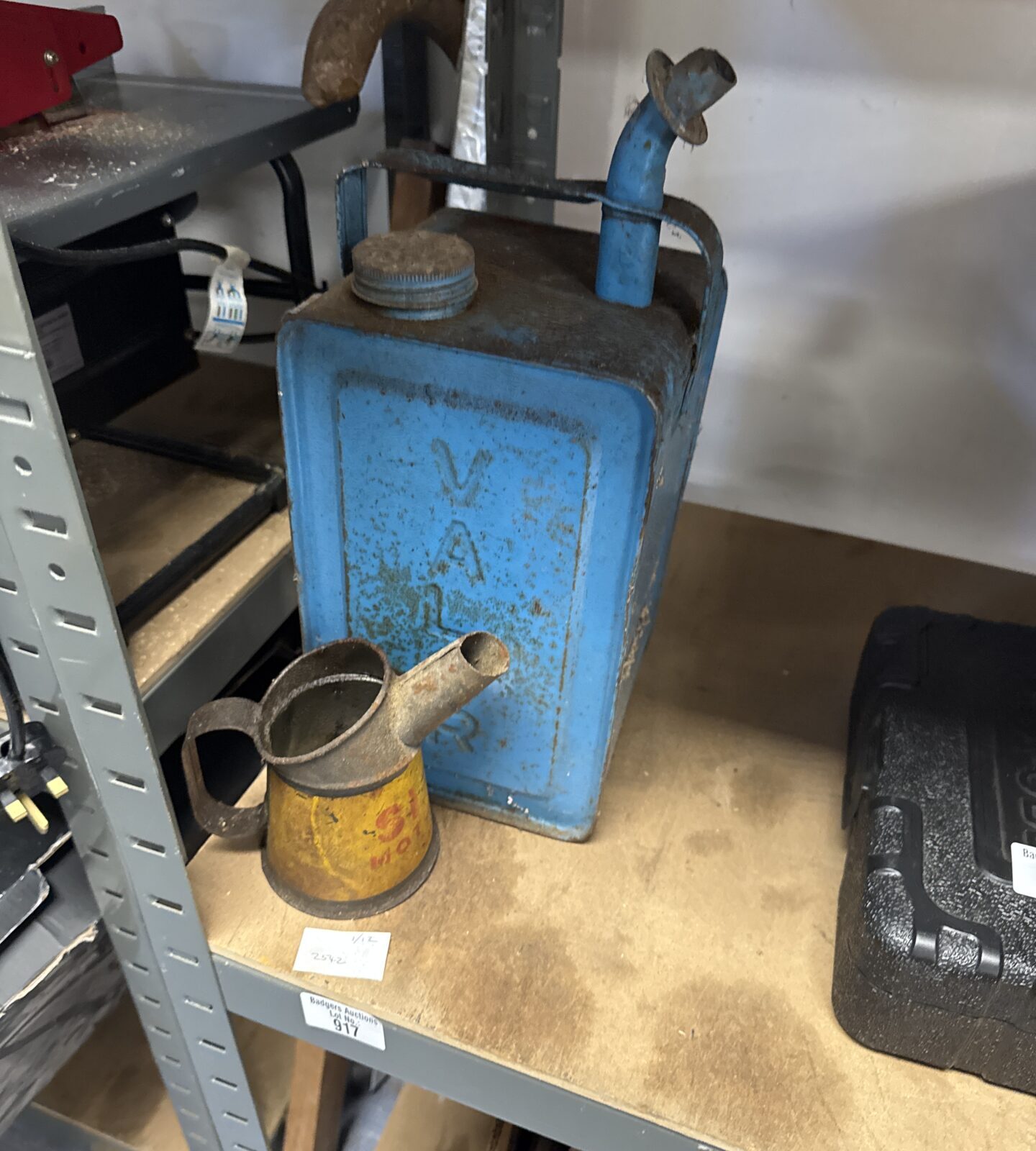 Two vintage oil cans inc shell