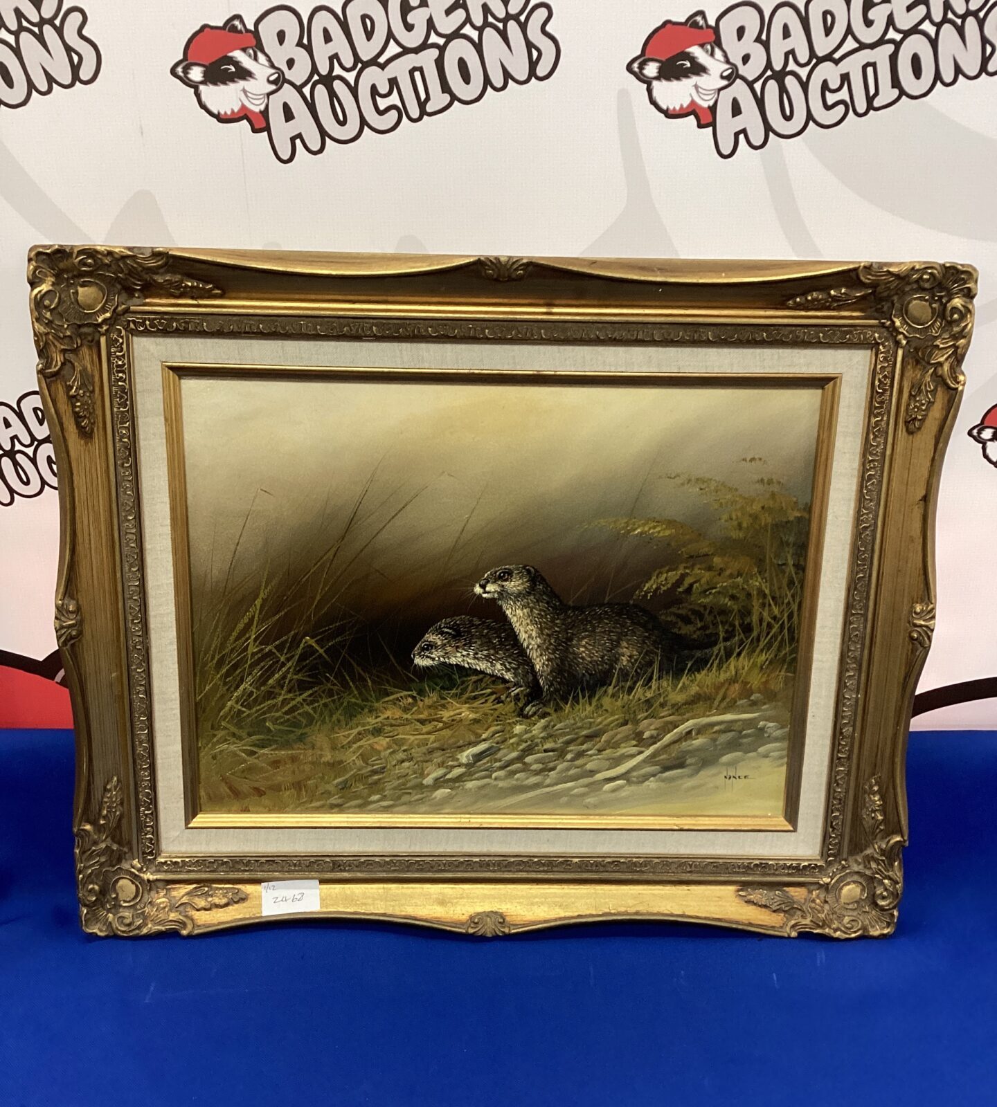 Oil on board of otters signed nance