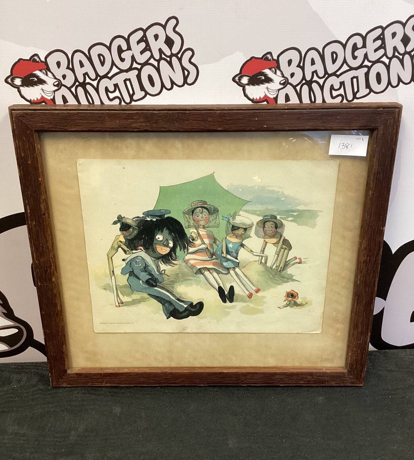 Vctorian framed print of golly & dolly on the beach