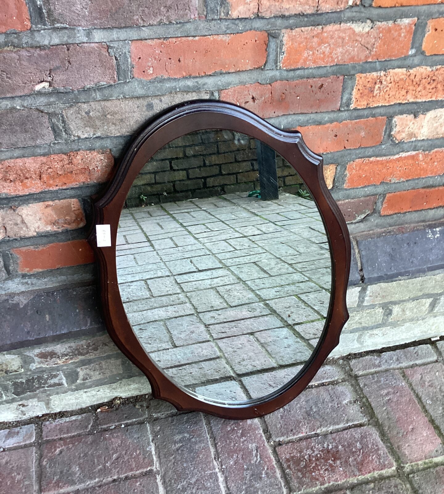 Oval mahogany framed mirror