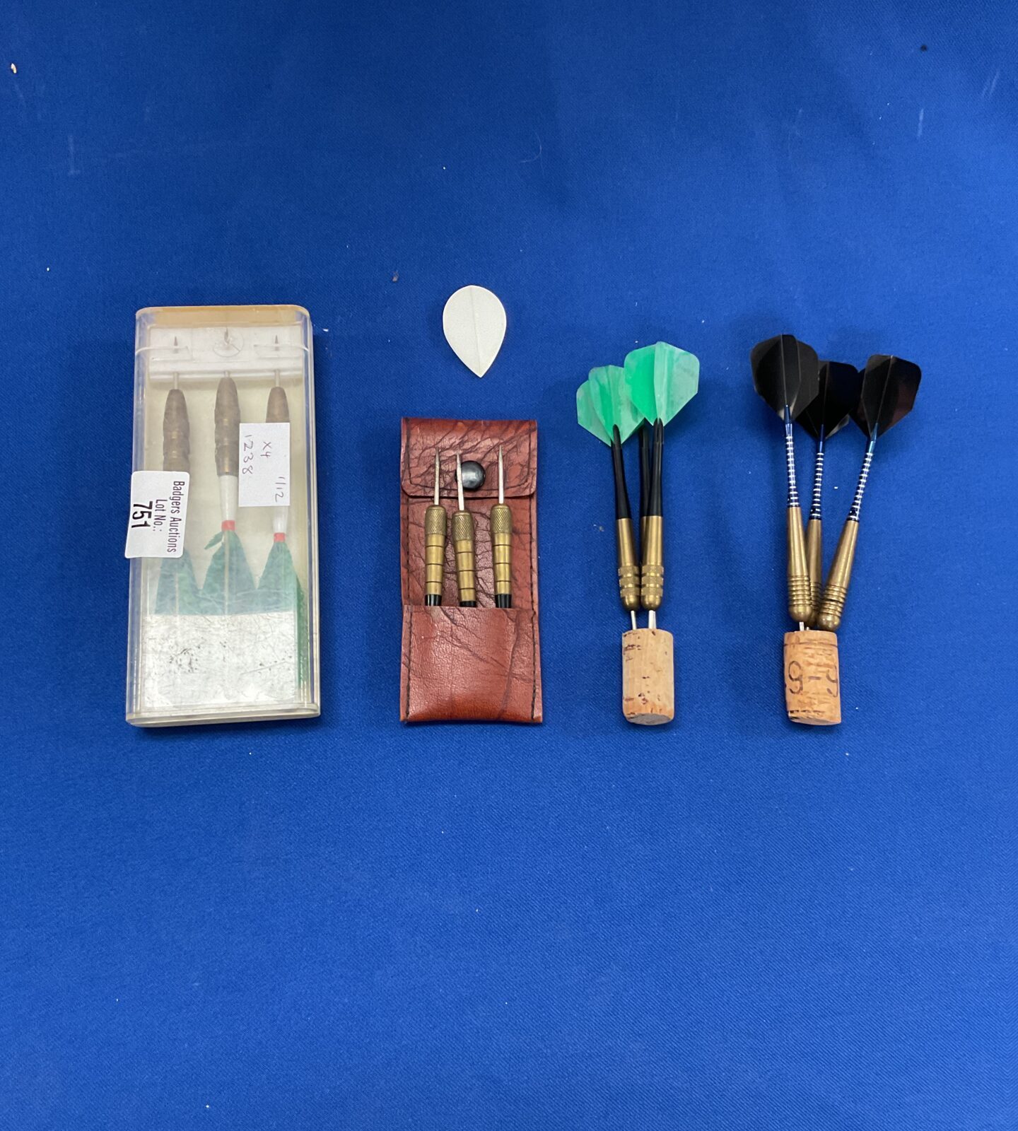 Selection of vintage darts inc unicorn