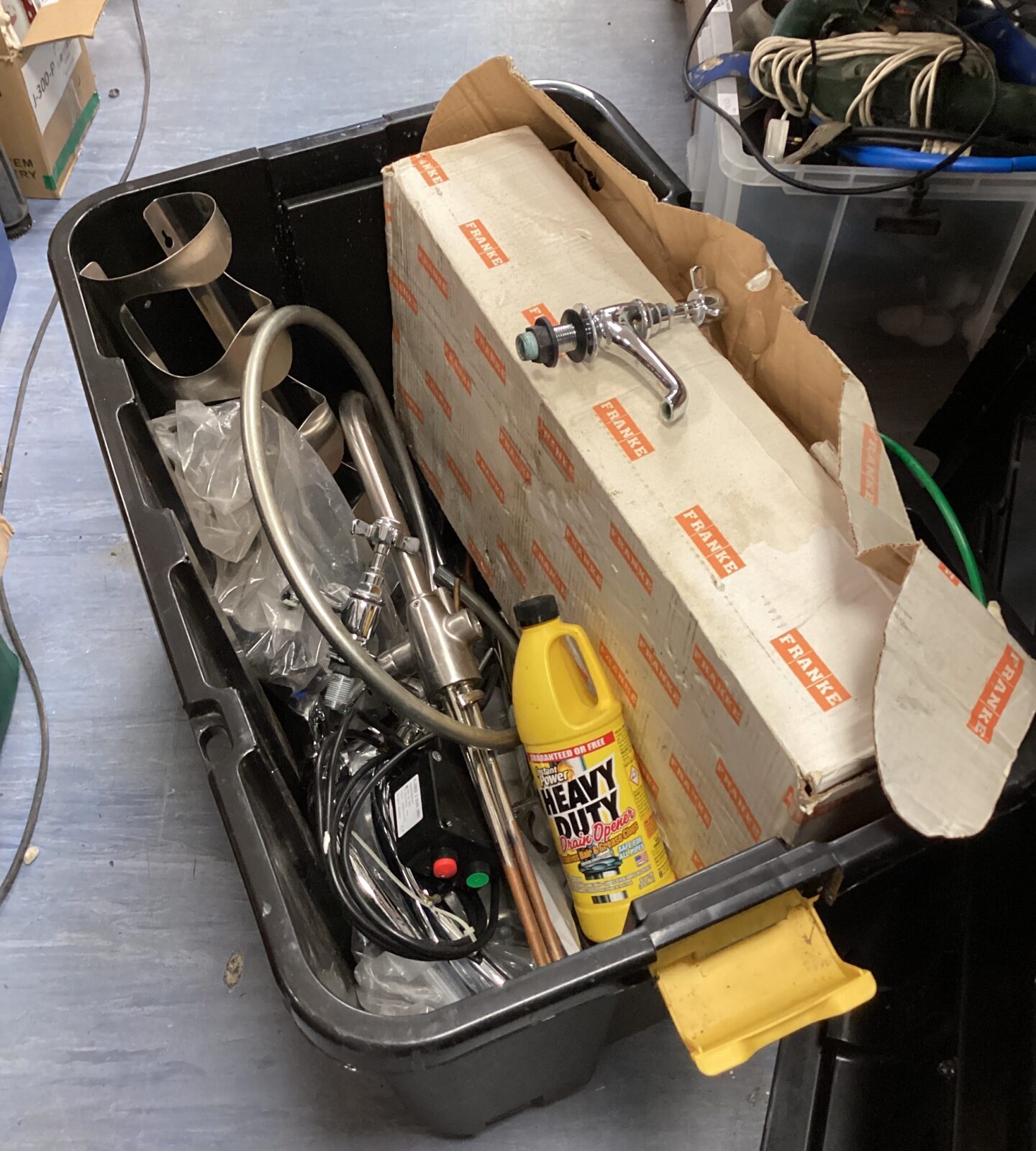 Large box of plumbing items including taps