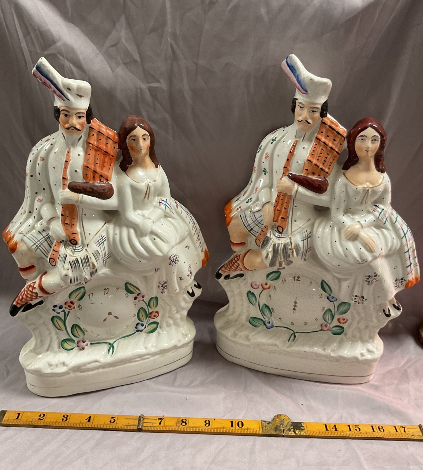 Two Staffordshire highland couple flatbacks