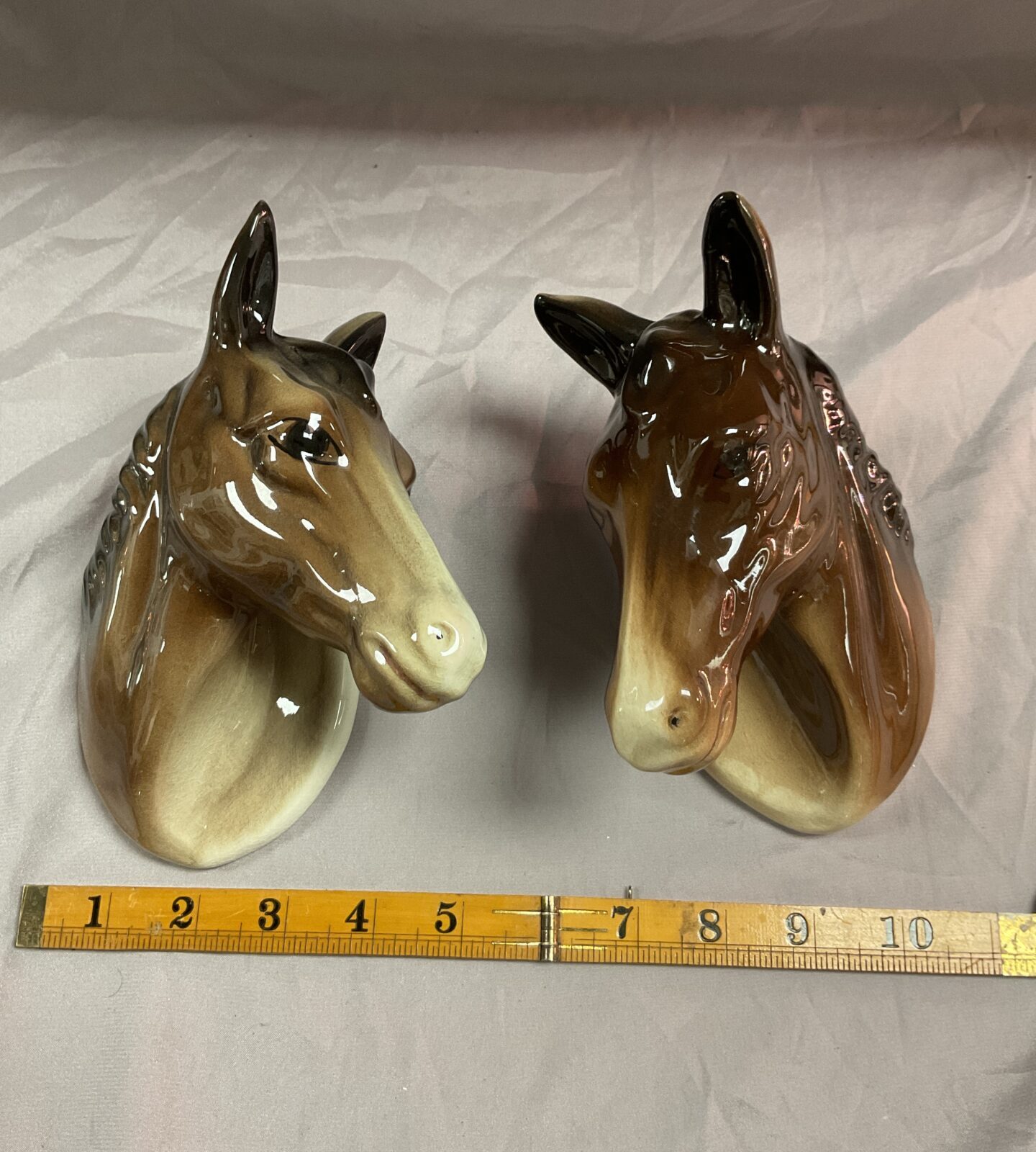 Two ceramic wall mount horse heads