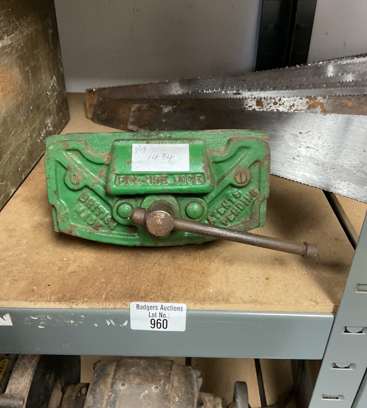 Small vintage green bench vice