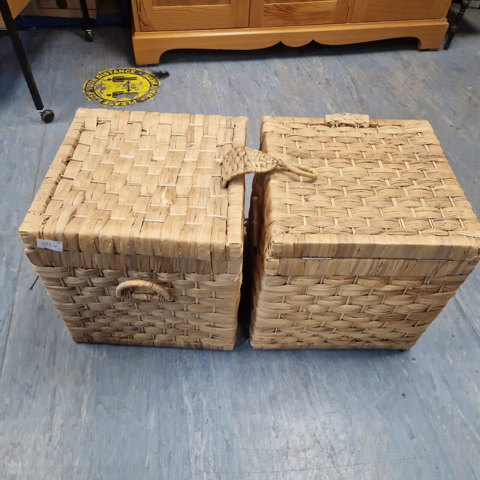 two wicker cub storage boxes