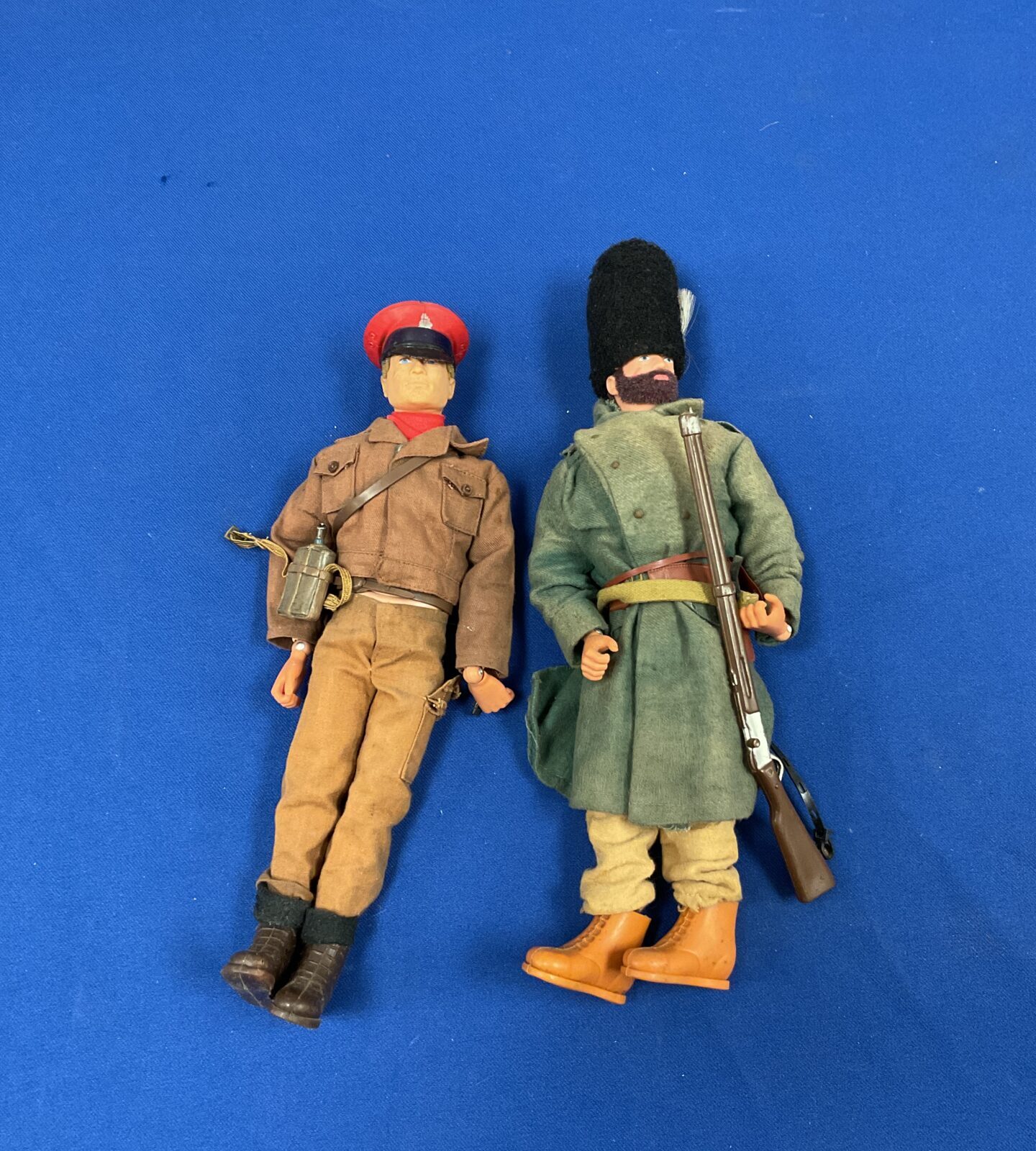 two 1964 palitoy action man figures in british and soviet uniforms