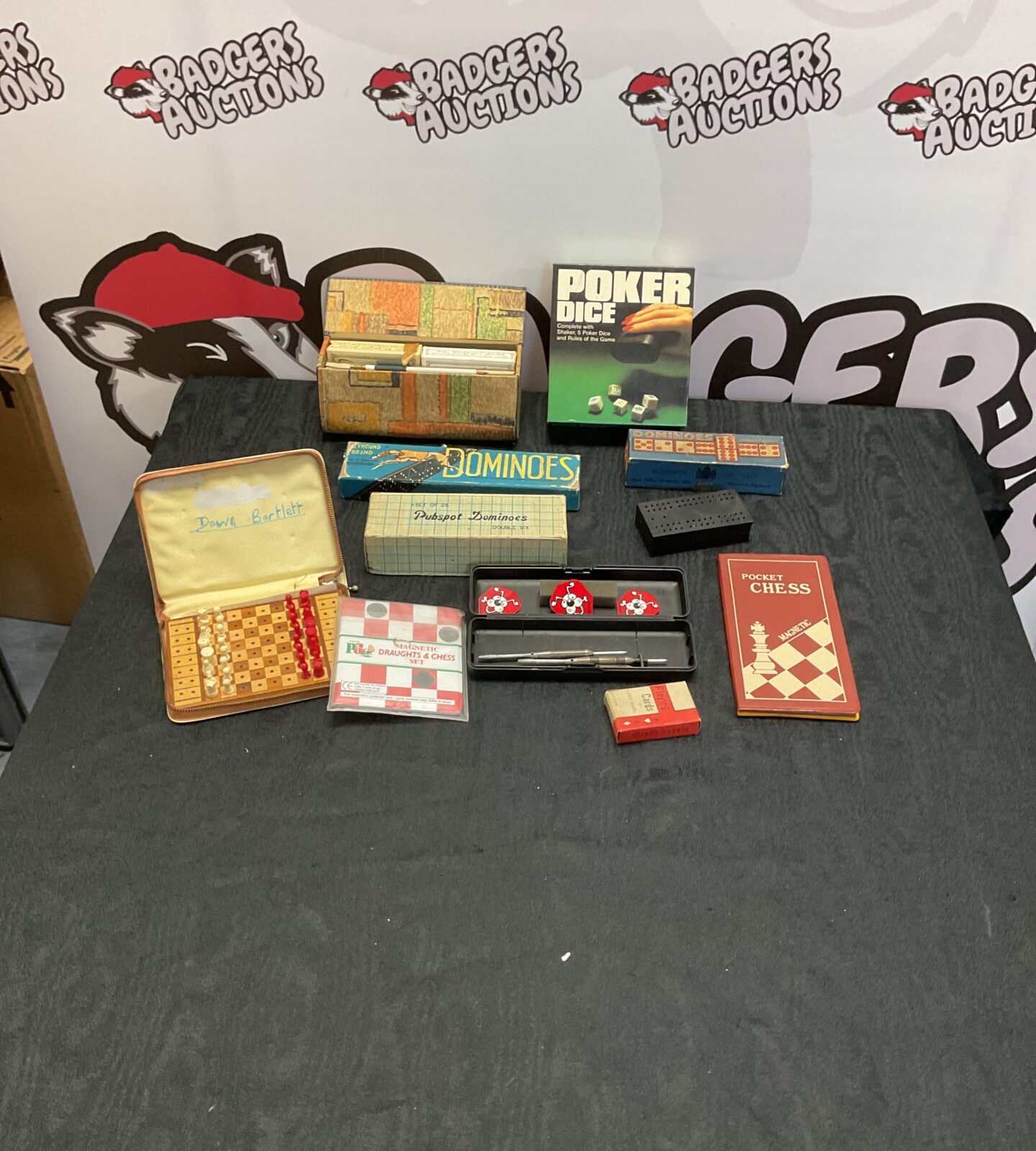 Box of mixed vintage games inc pocket chess, piker dice, dominos and darts