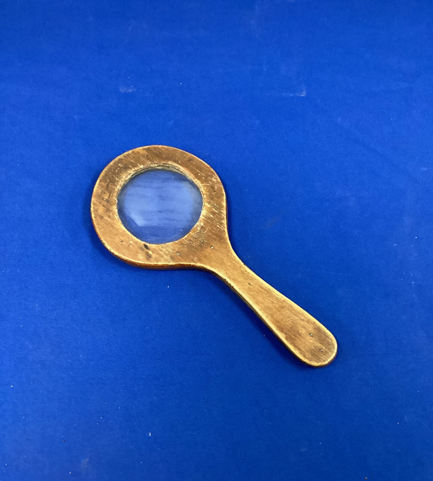 Large wood framed magnifying glass