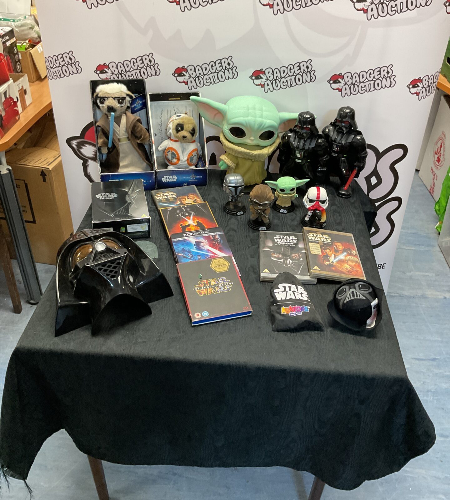 Selection of mixed star wars items inc dvds, collection of funko pops, meerkat movies toys and darth vader mask