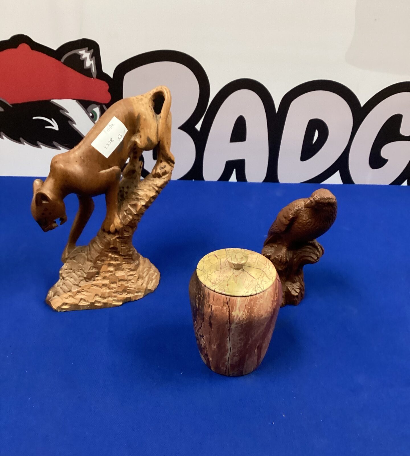 Two hand carved wooden figurines plus hand turned Vase