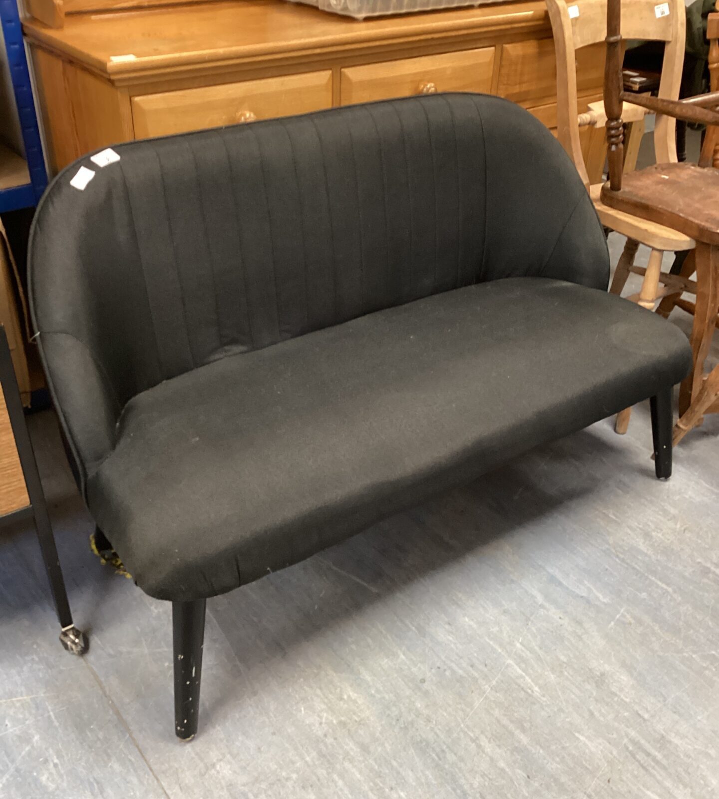 small black 2 seater sofa